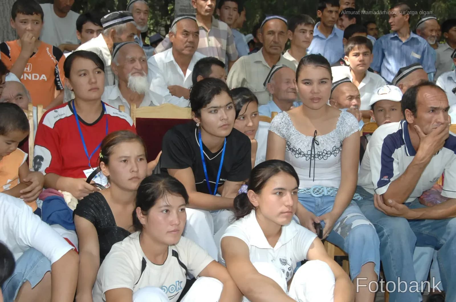 Diverse crowd of people gathered outdoors