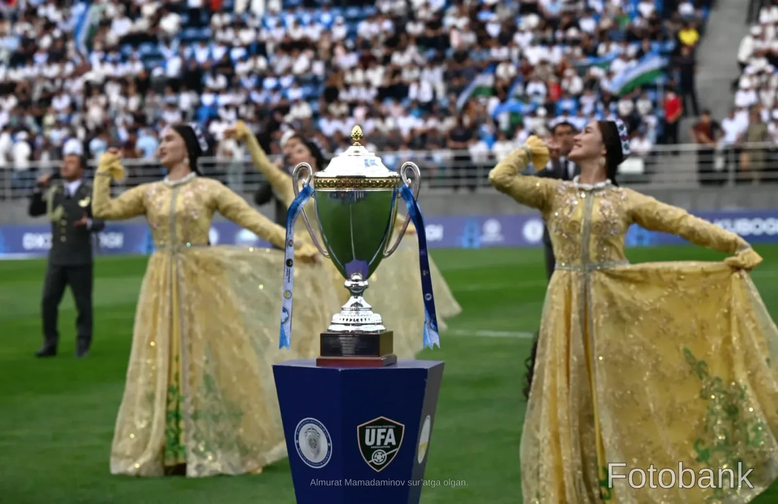 Trophy cup on display in a stadium