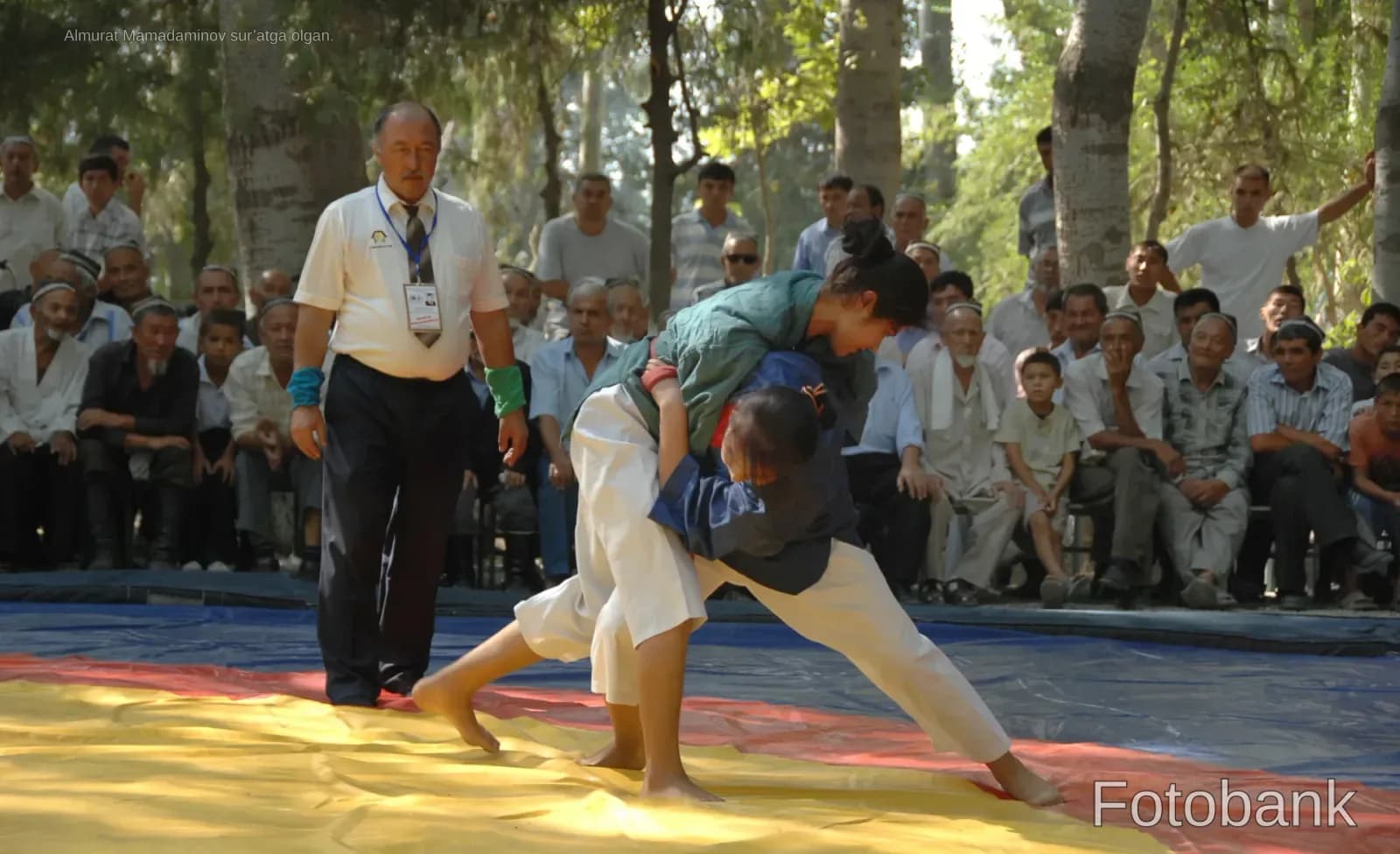Athletes competing in a match outdoors