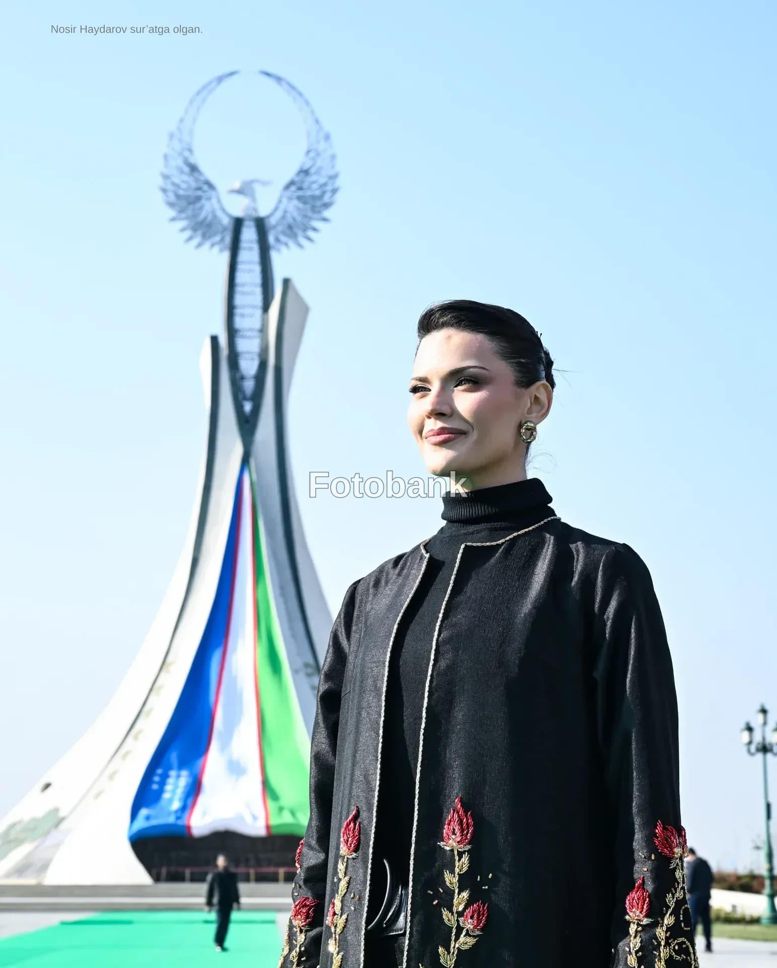 Portrait of a woman standing outdoors