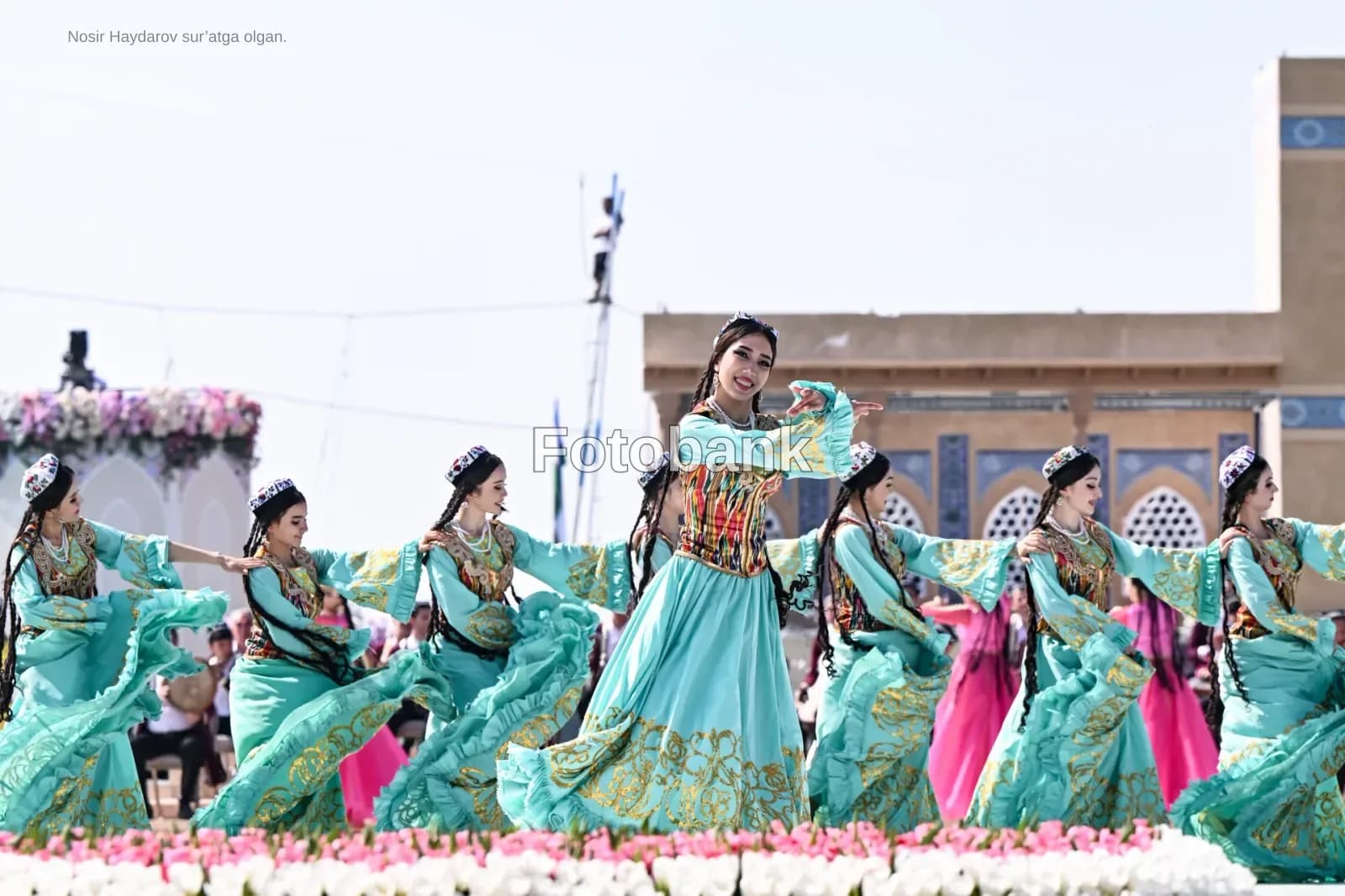 Performers in traditional attire dance during a cultural festival