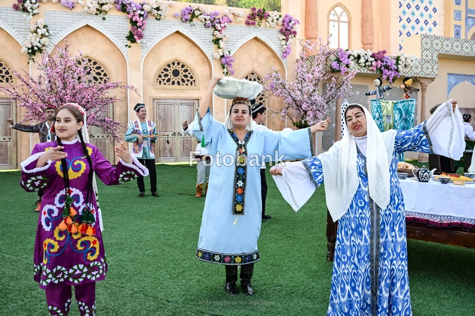 People performing traditional dances outdoors