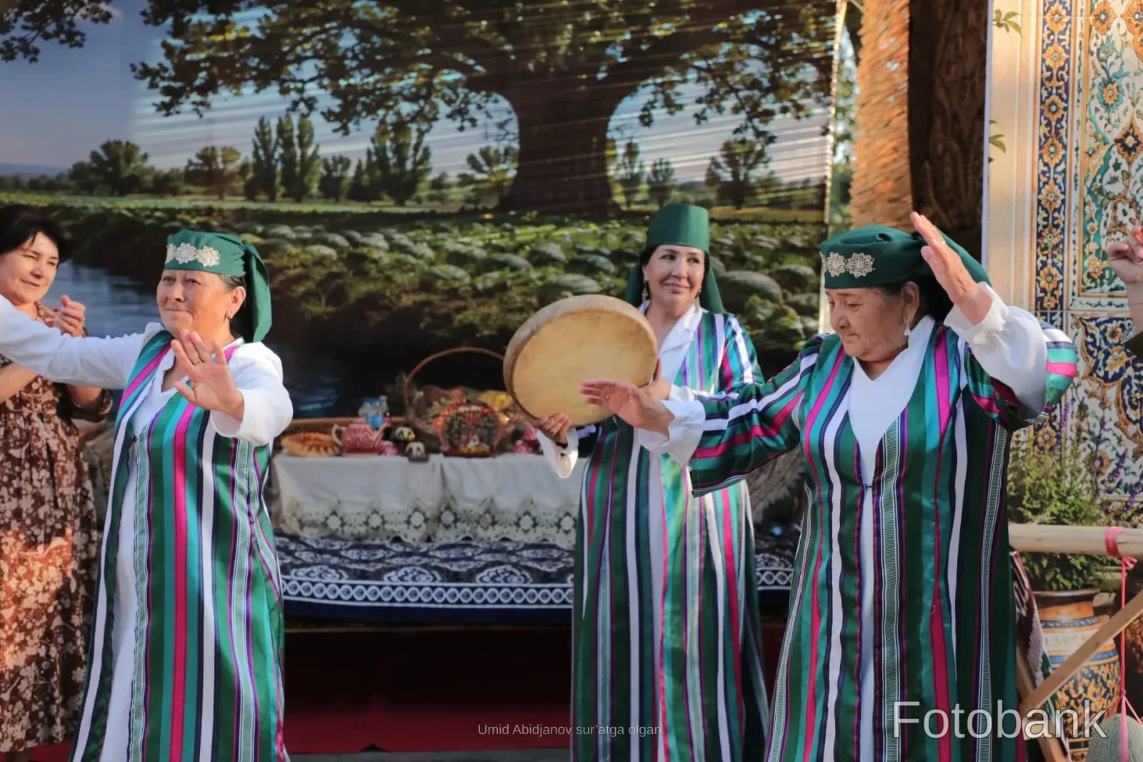 Women performing traditional dance in colorful attire