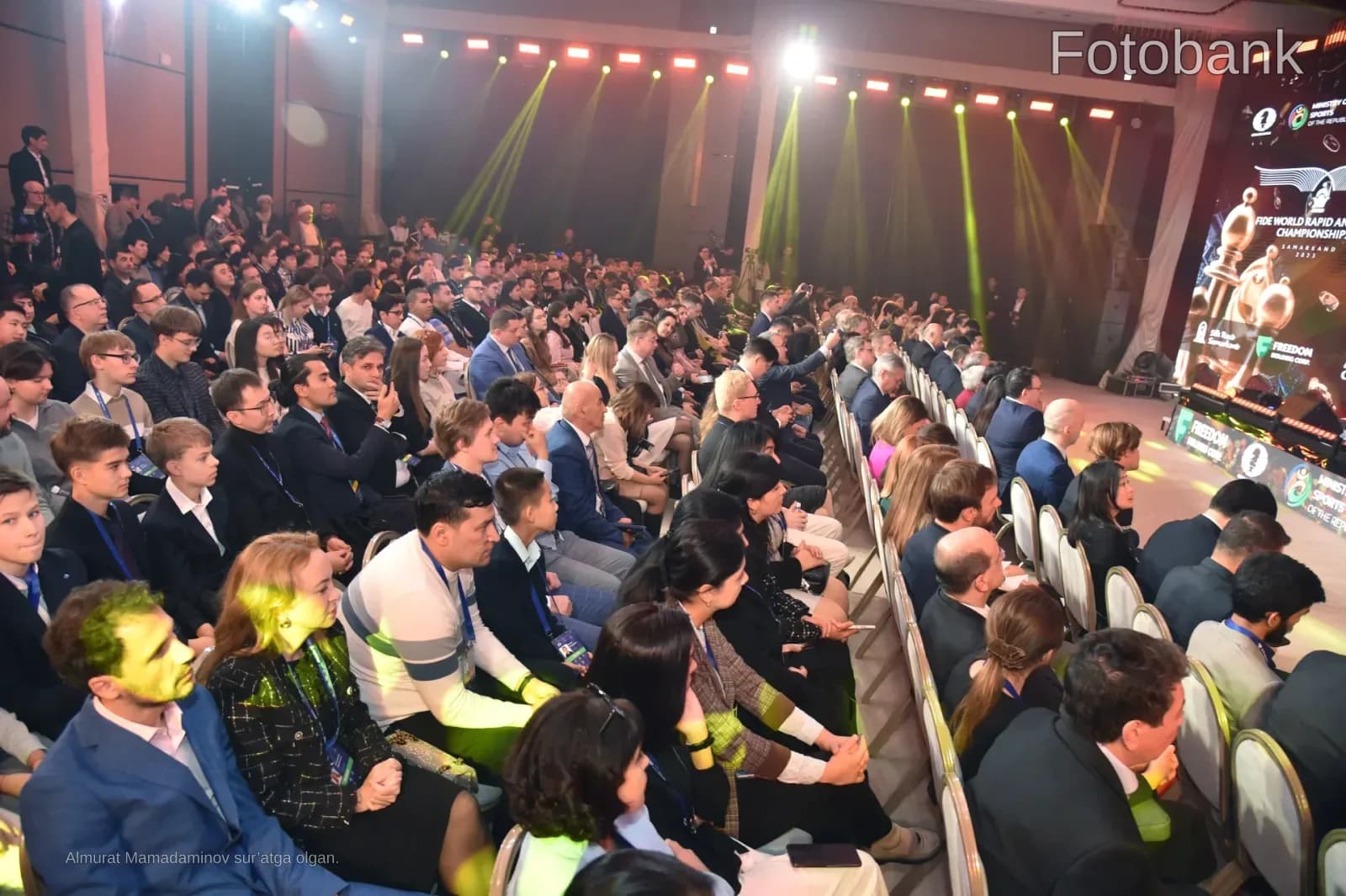 Large audience gathered in a conference hall
