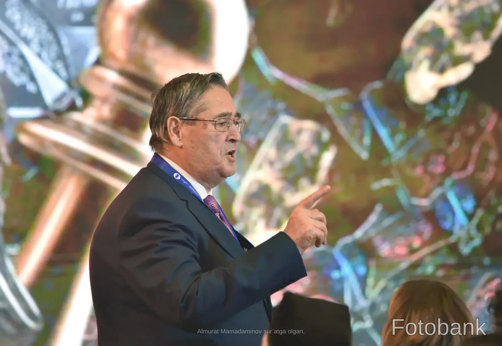 Man speaking at a conference