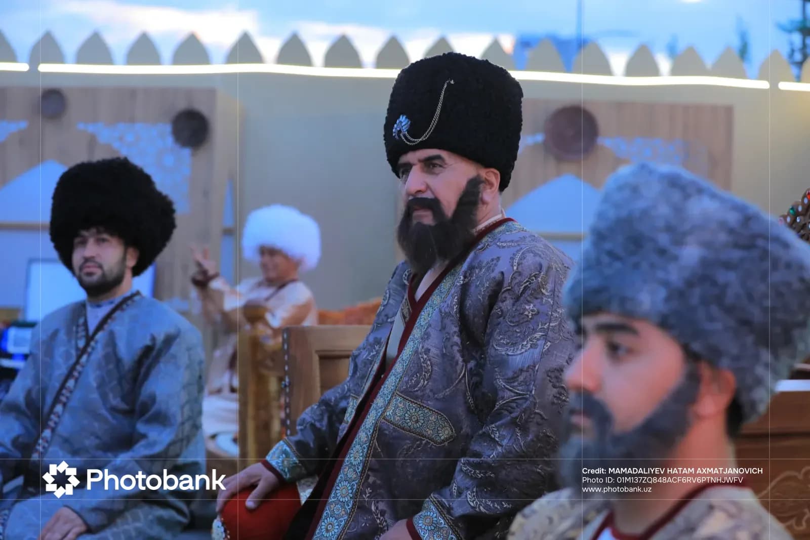 People in traditional clothing and fur hats