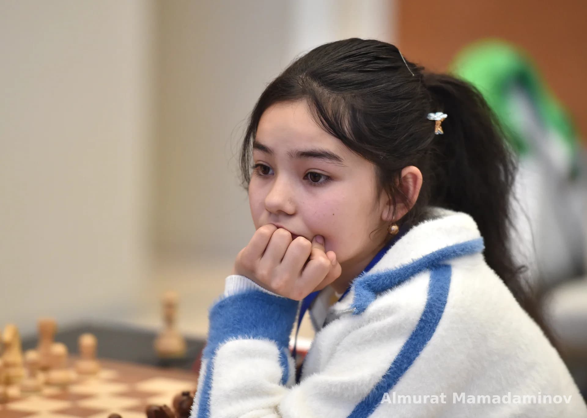 Young girl participating in a chess competition