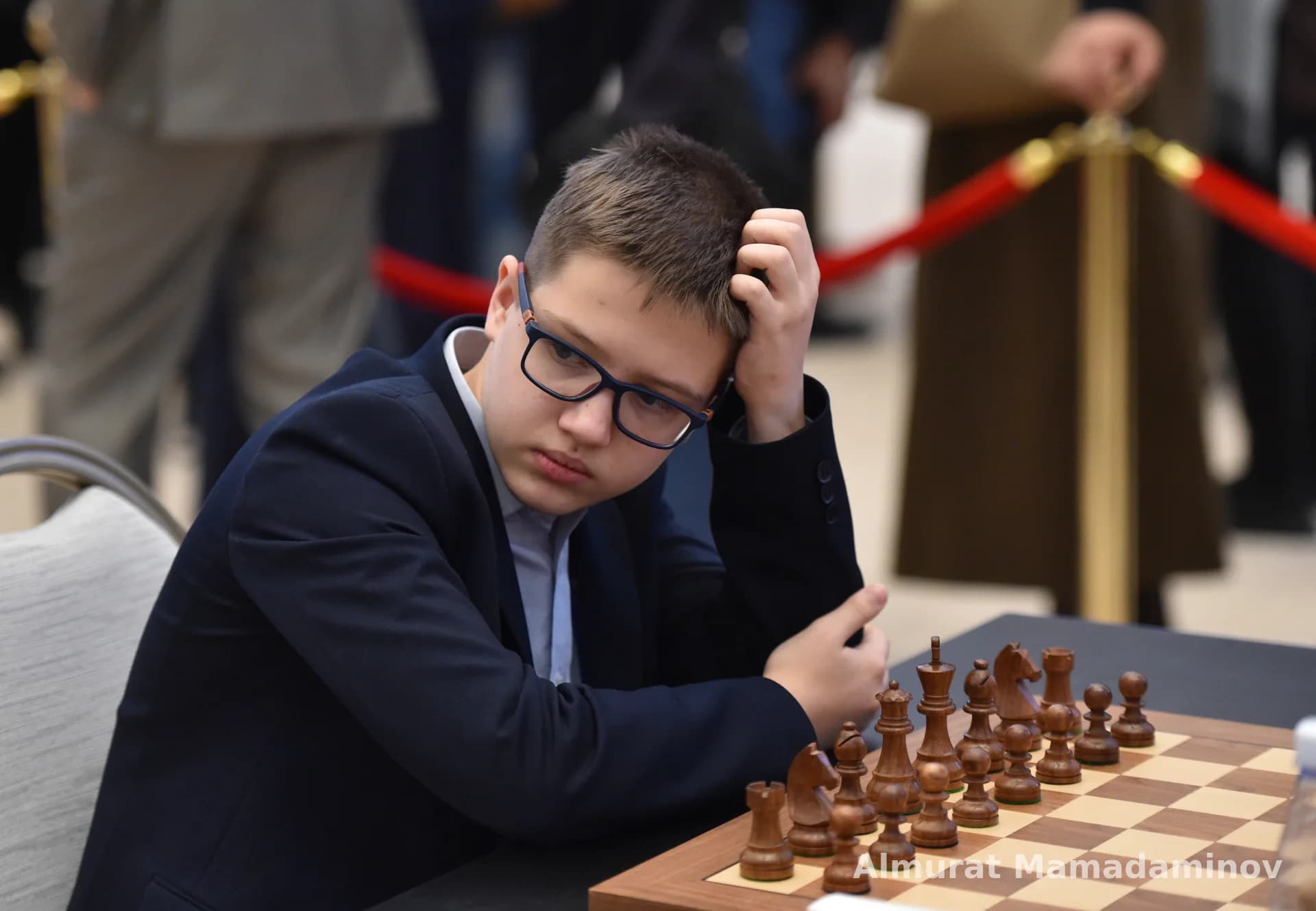 Young person playing chess