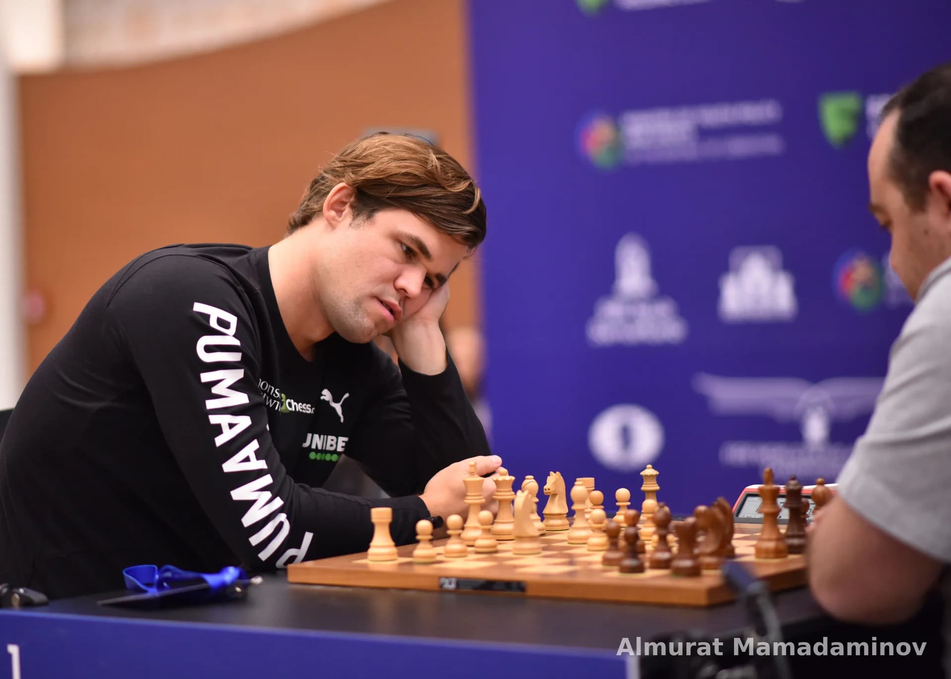 Men playing chess in a competition