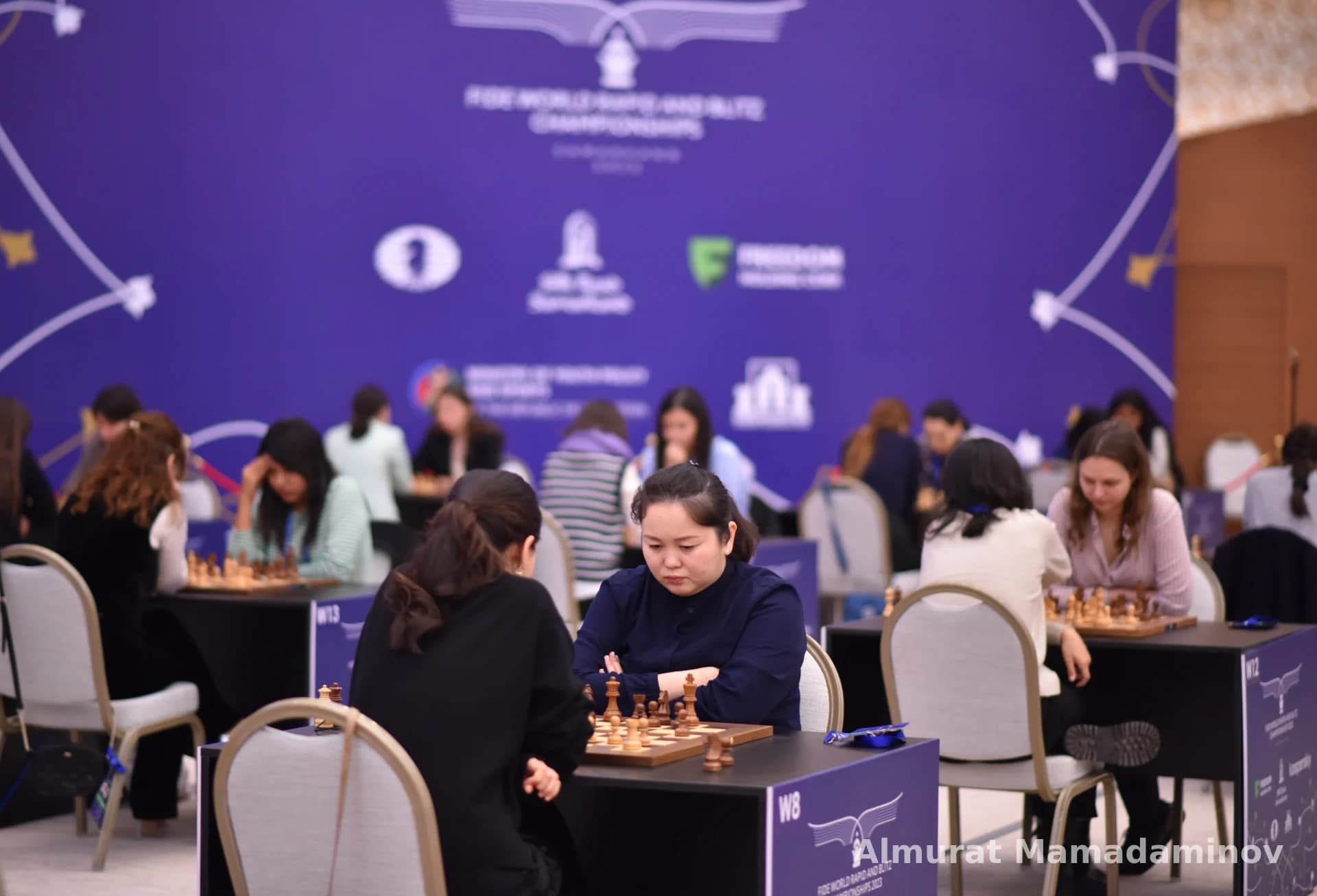 People playing chess at a competition