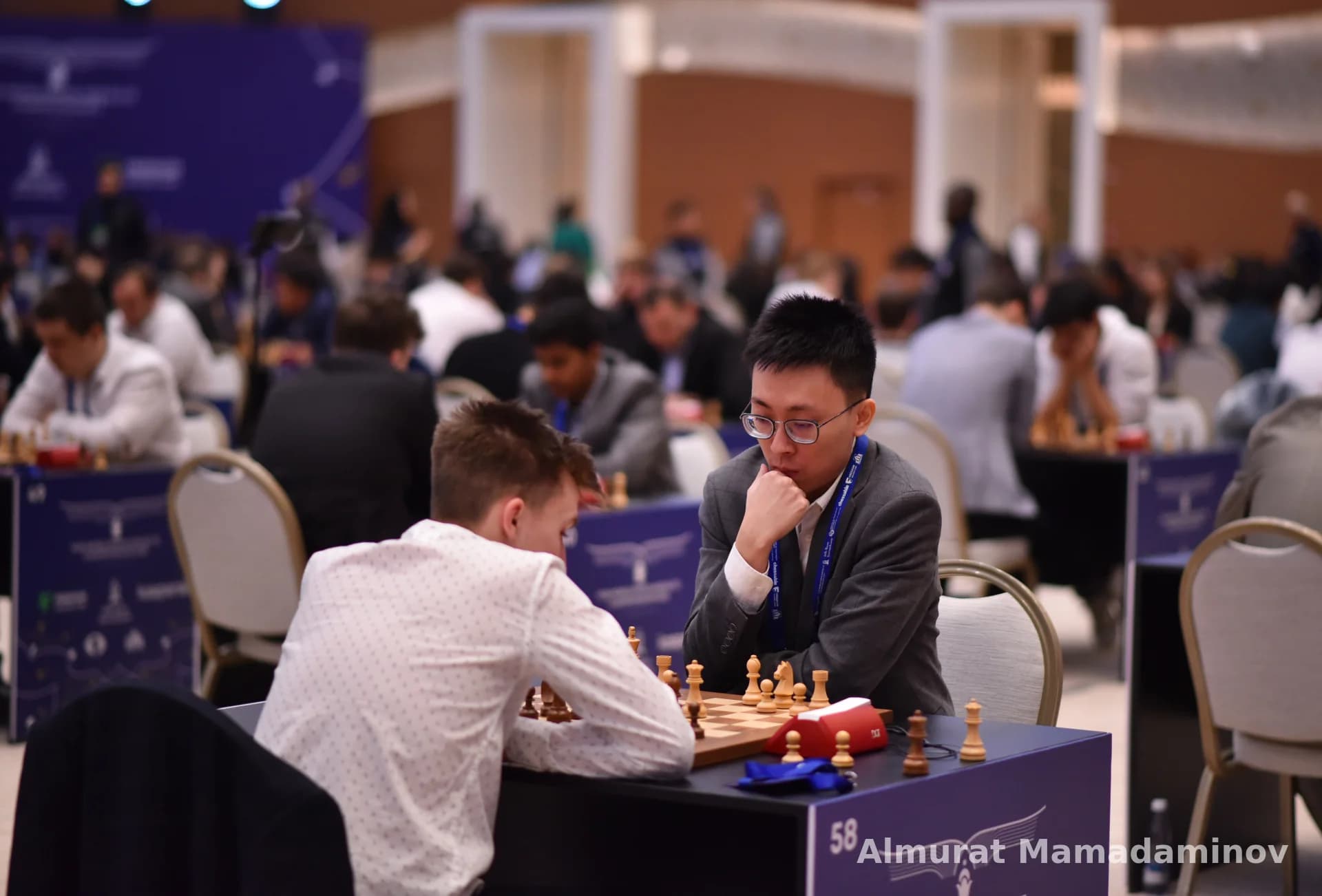 People playing chess at a competition