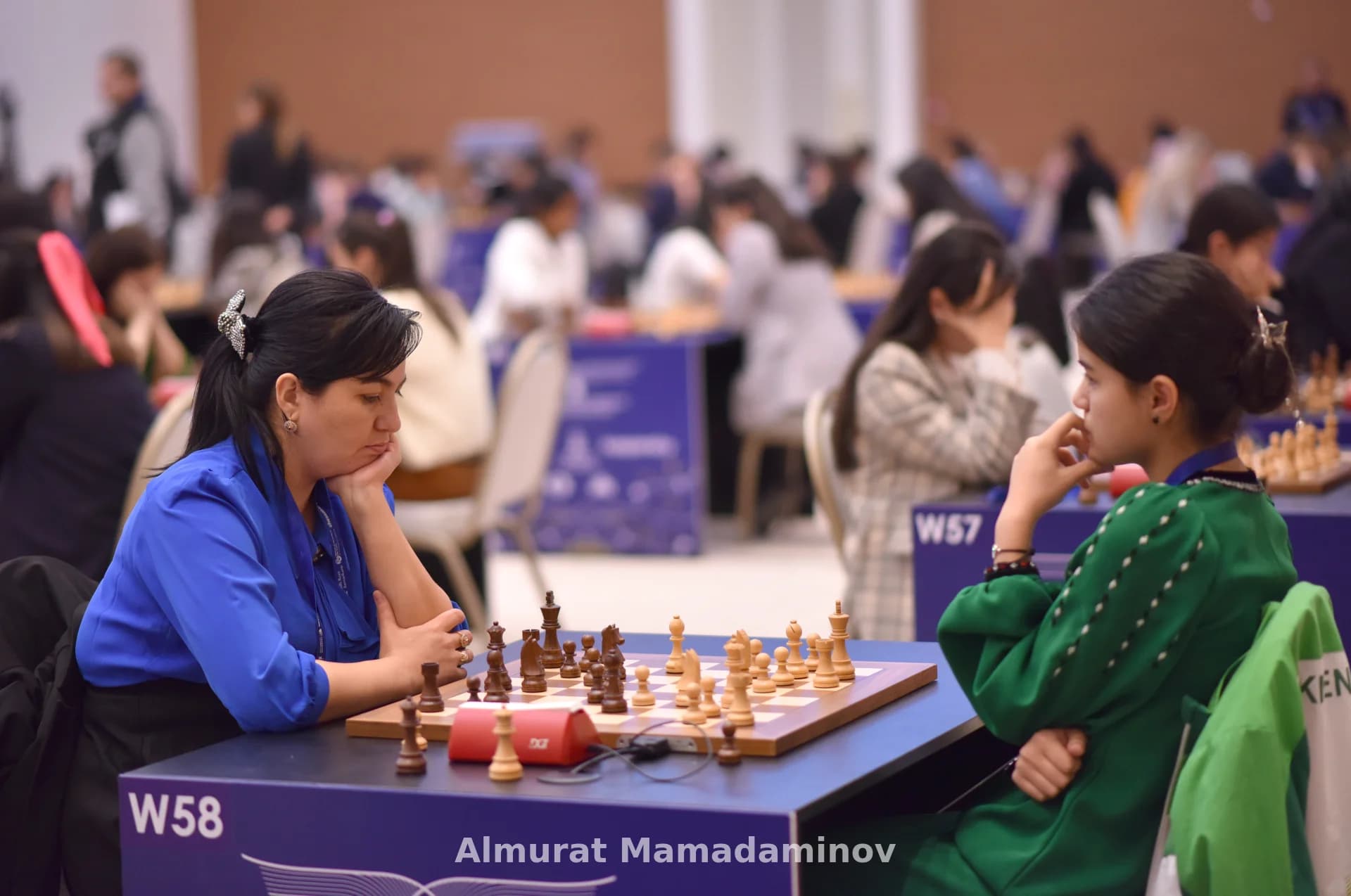 People playing chess at a competition