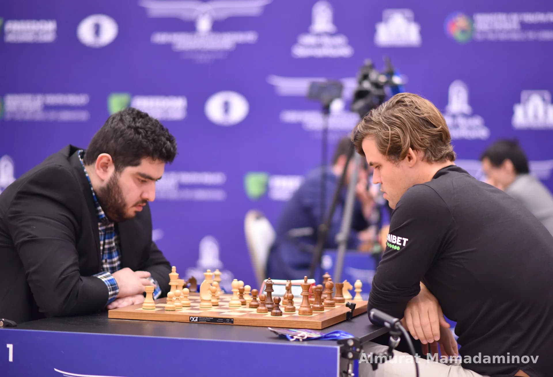 Men playing chess in a competition