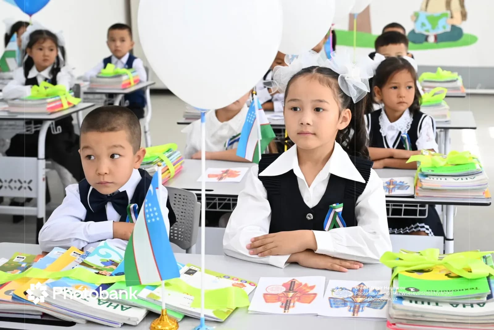 Children sitting at desks in a classroom