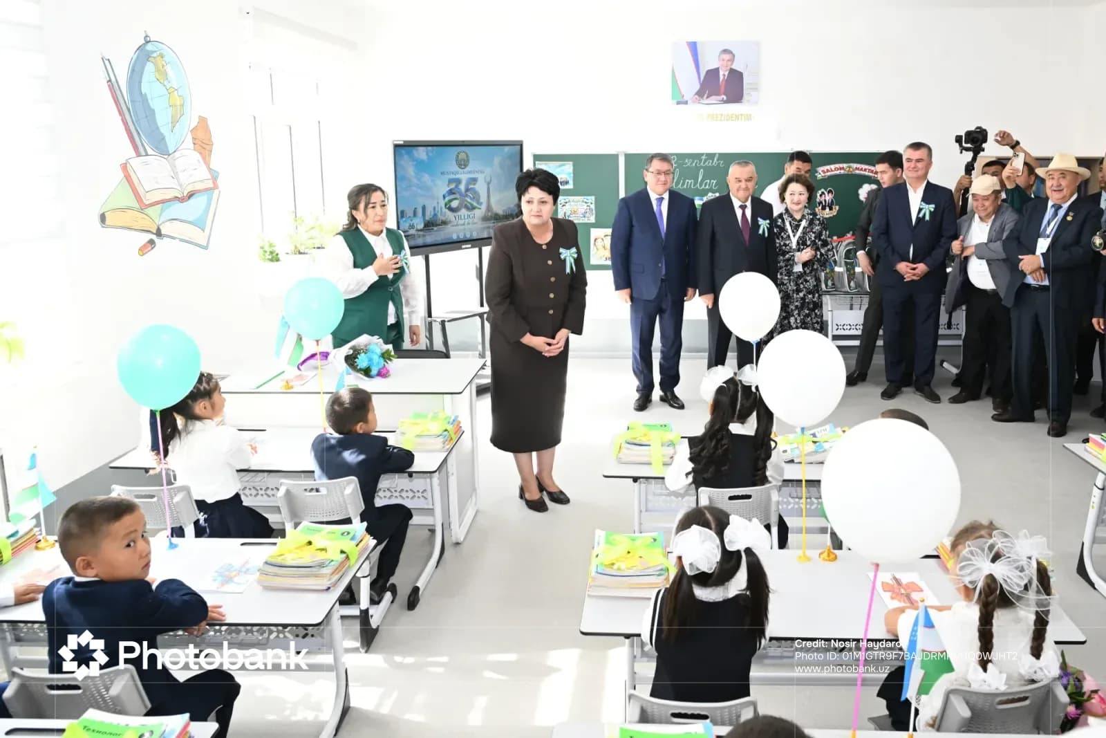 People gathered in a brightly lit classroom