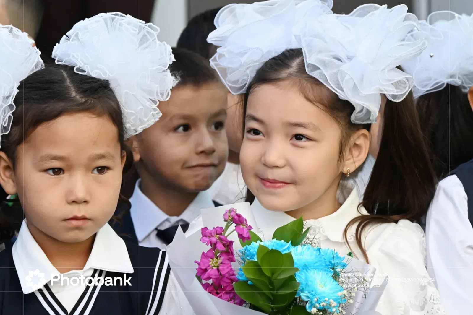 Children holding flowers