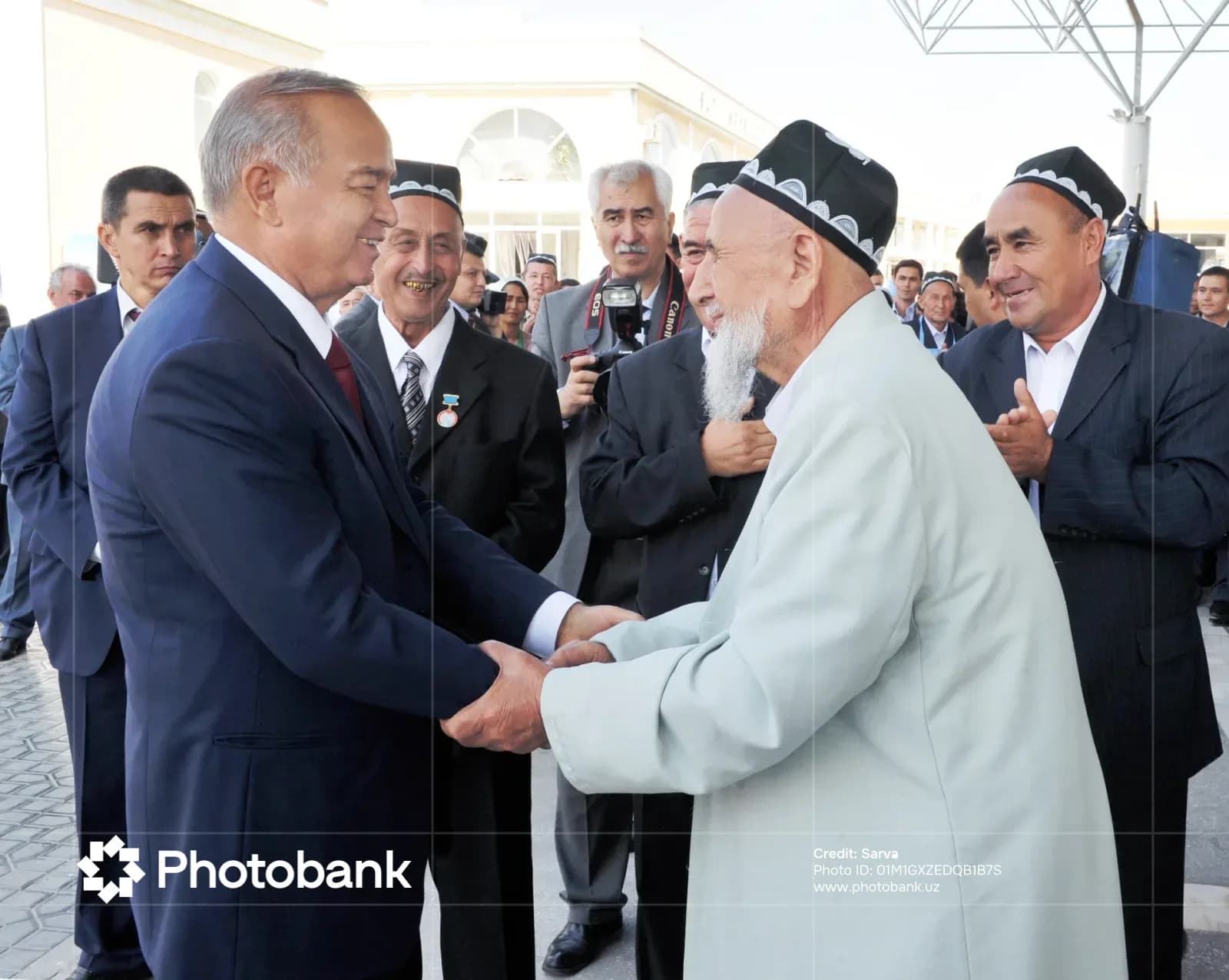 Men shaking hands outdoors