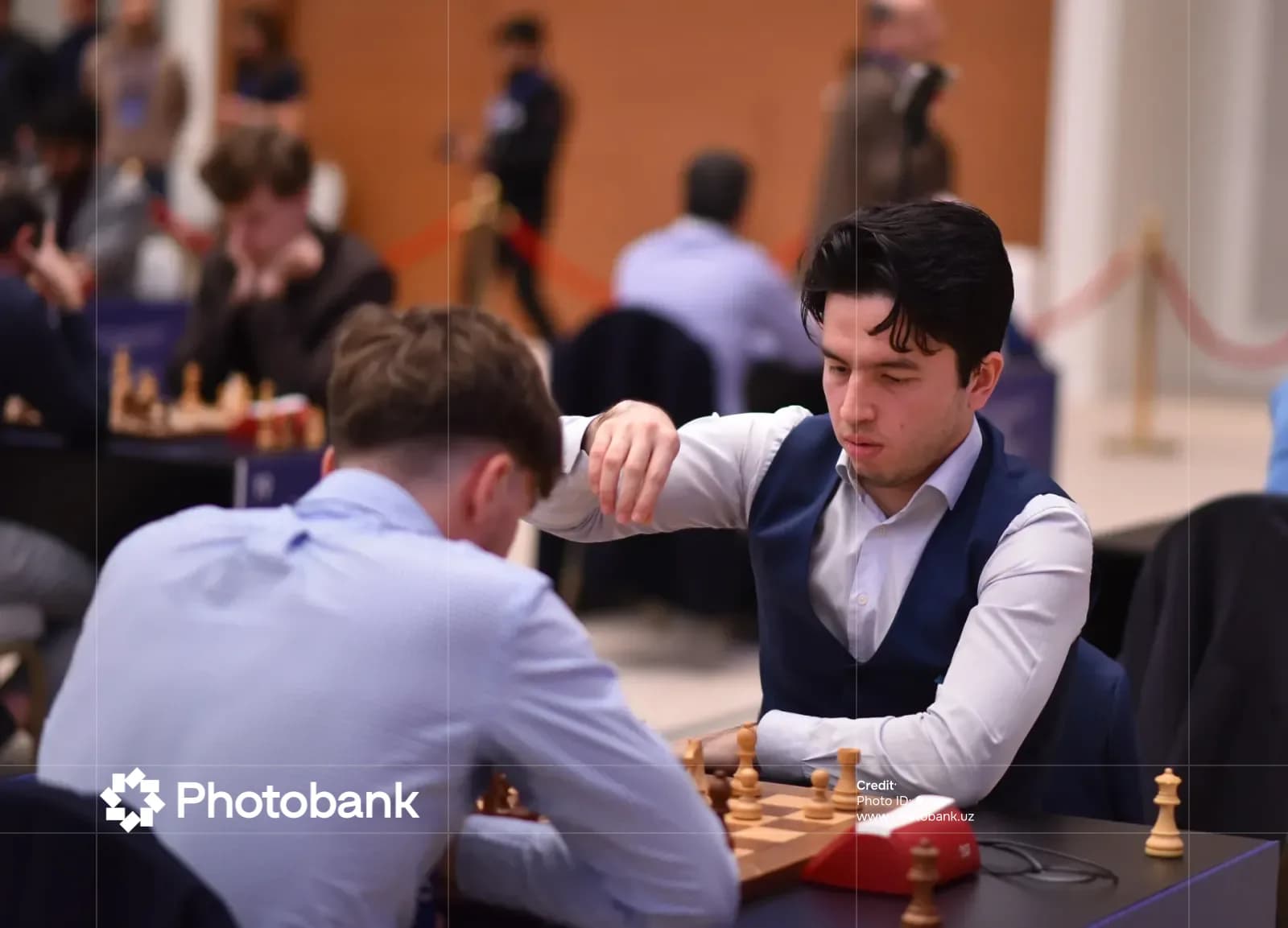 Competitors focused during a chess match in a hall
