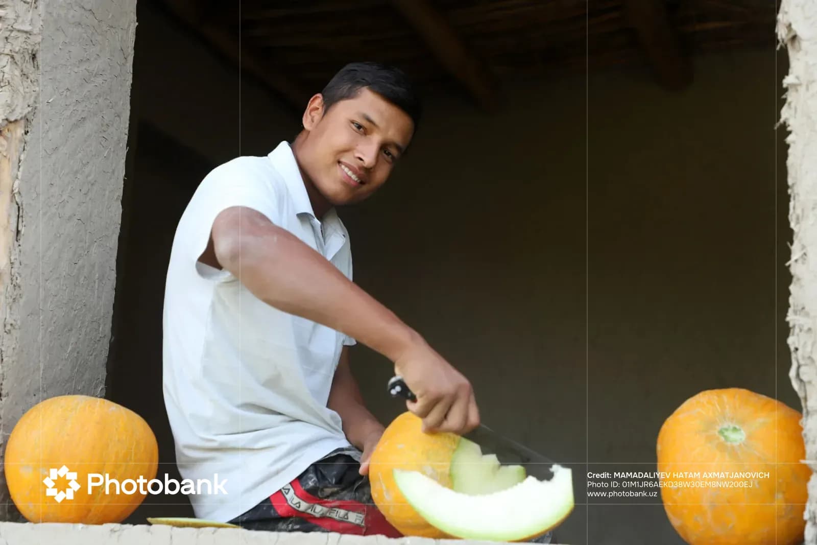 Young person cutting a melon