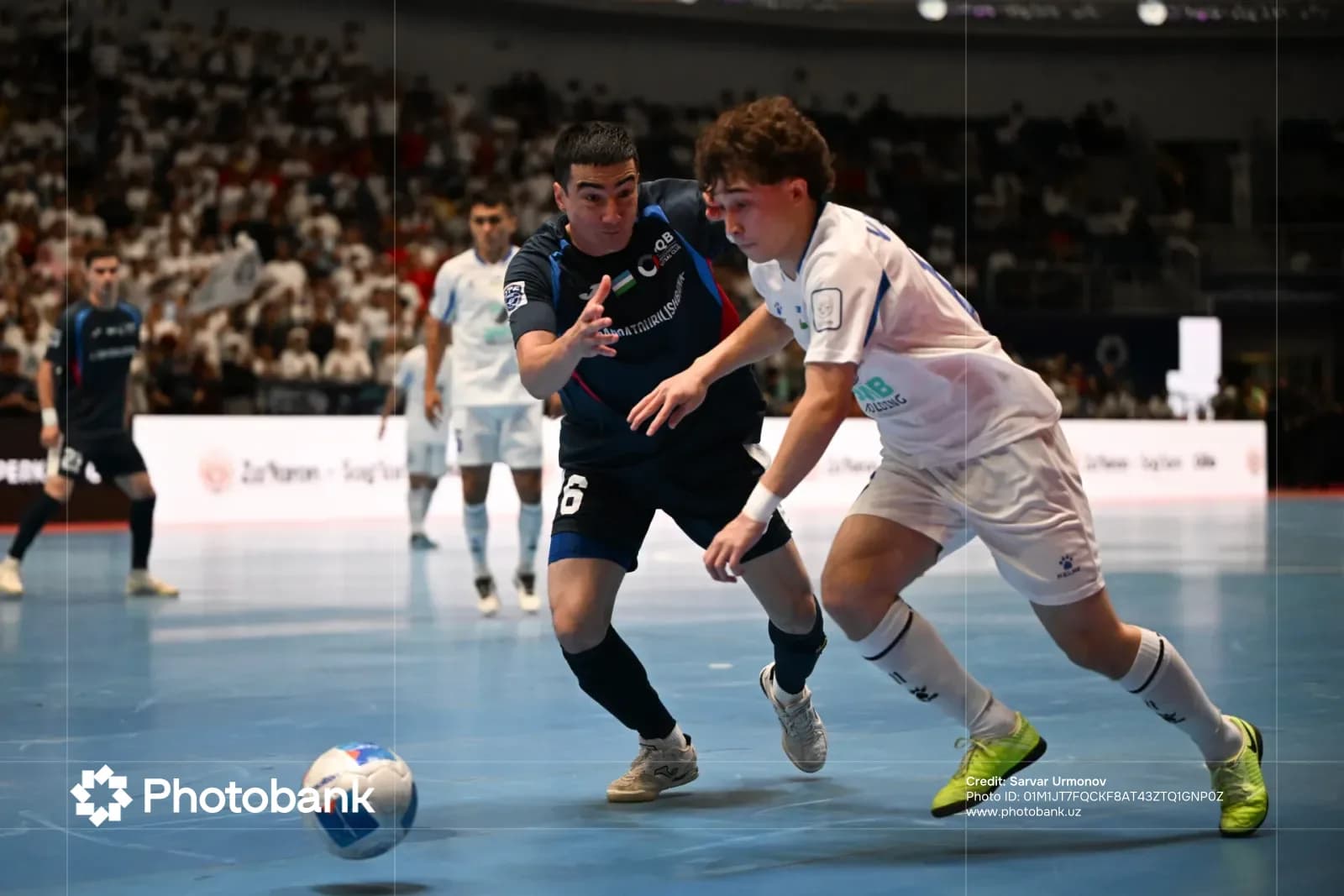 Athletes competing in an indoor sports match