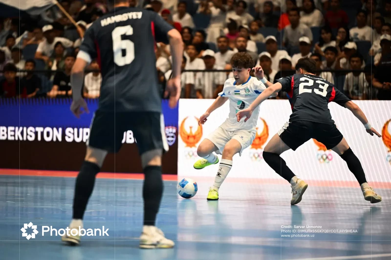 Athletes competing in an indoor sports match