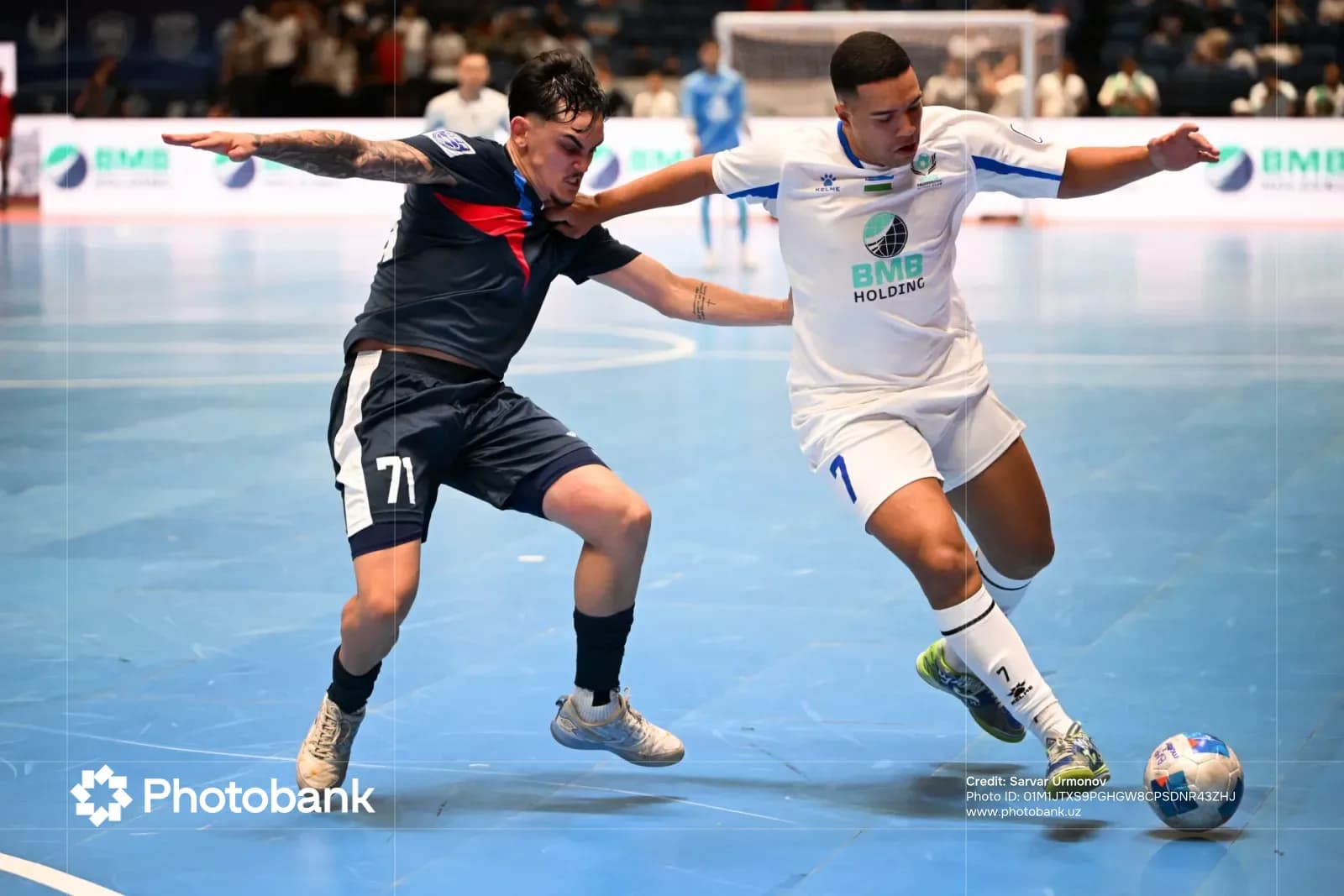 Athletes competing in an indoor match