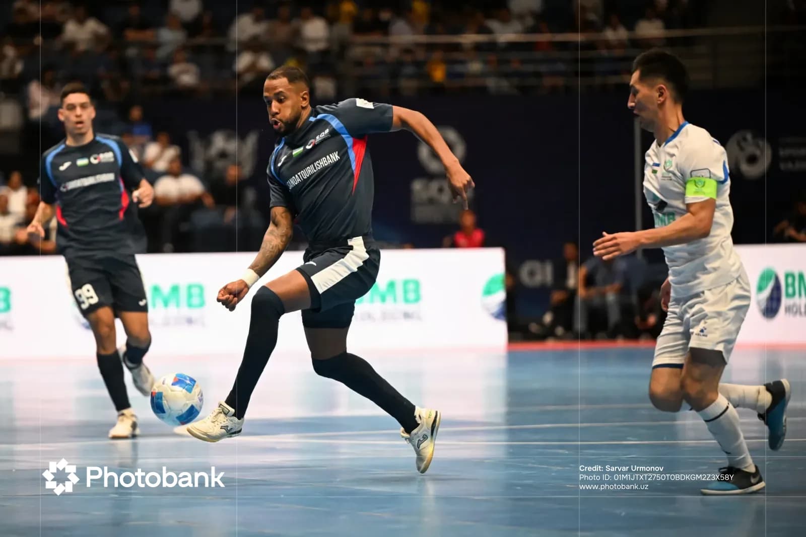 Athletes competing in an indoor match