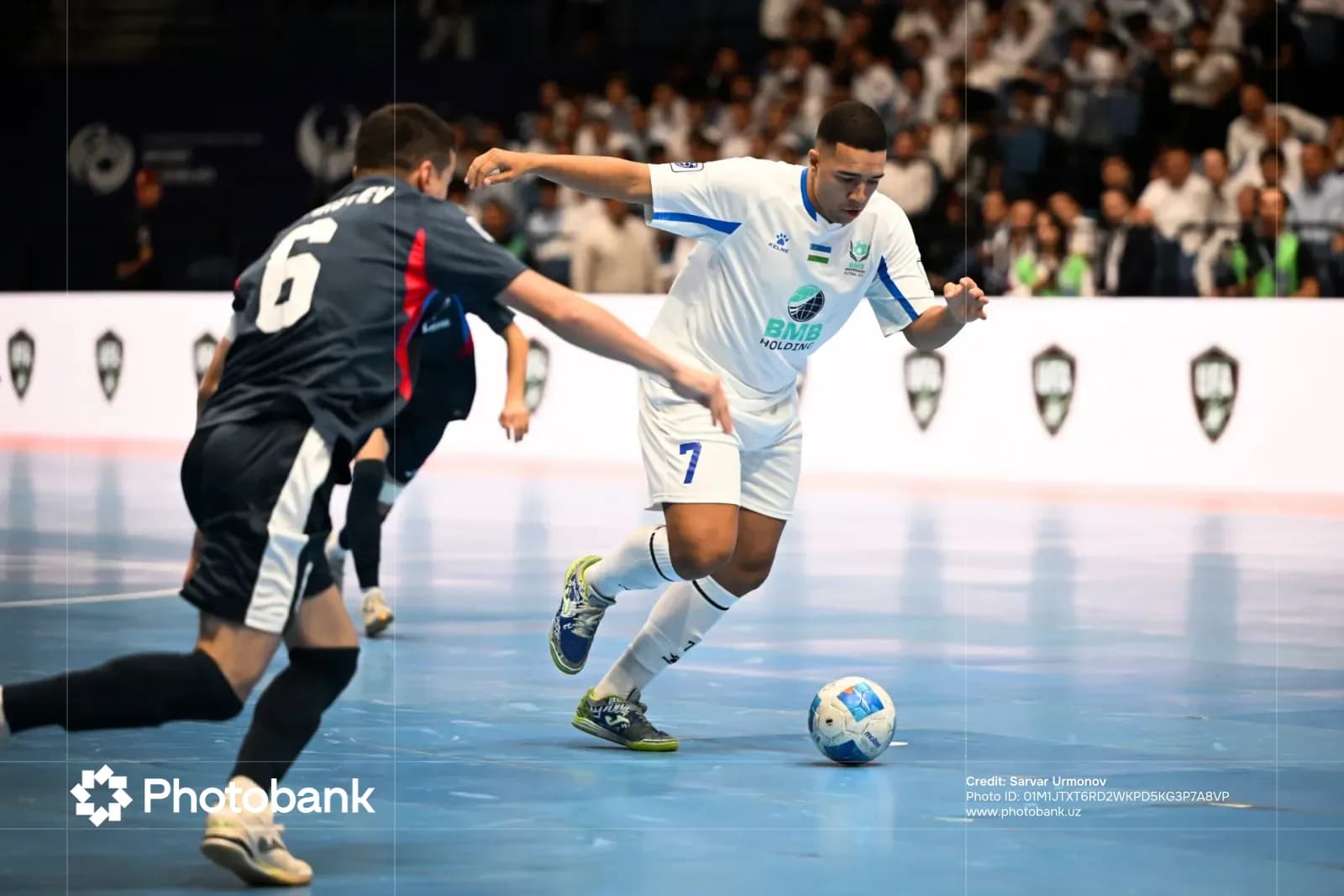 Athletes competing in an indoor match