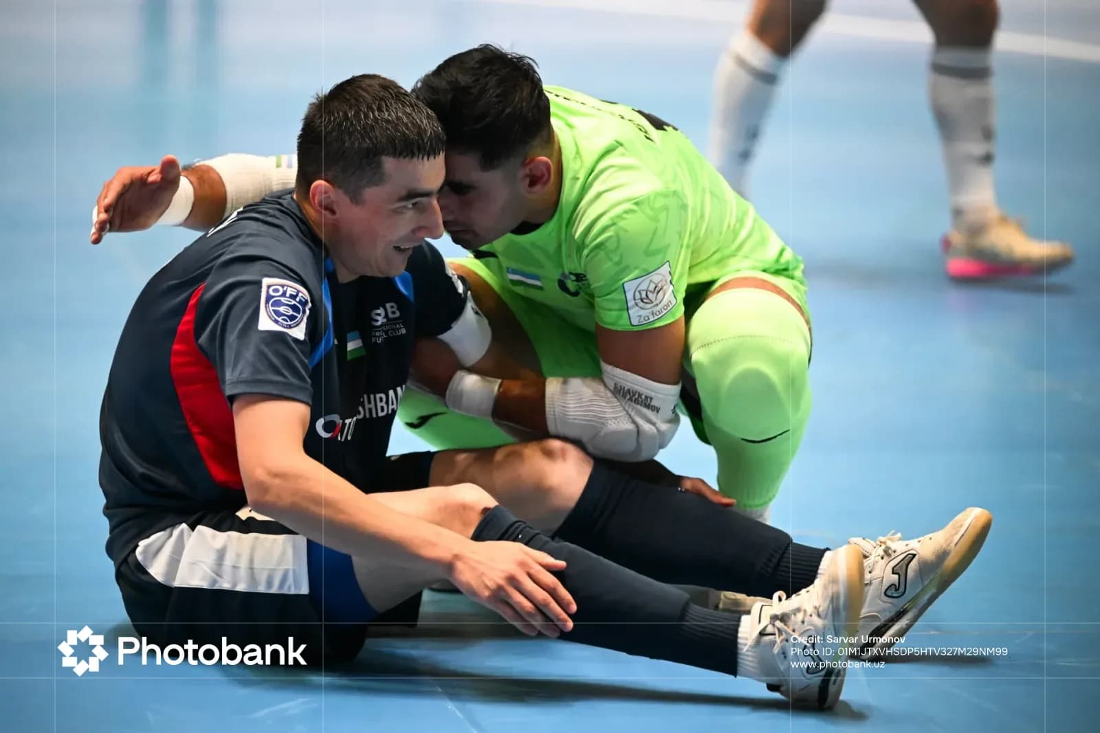 Athletes in sportswear interacting on an indoor sports court