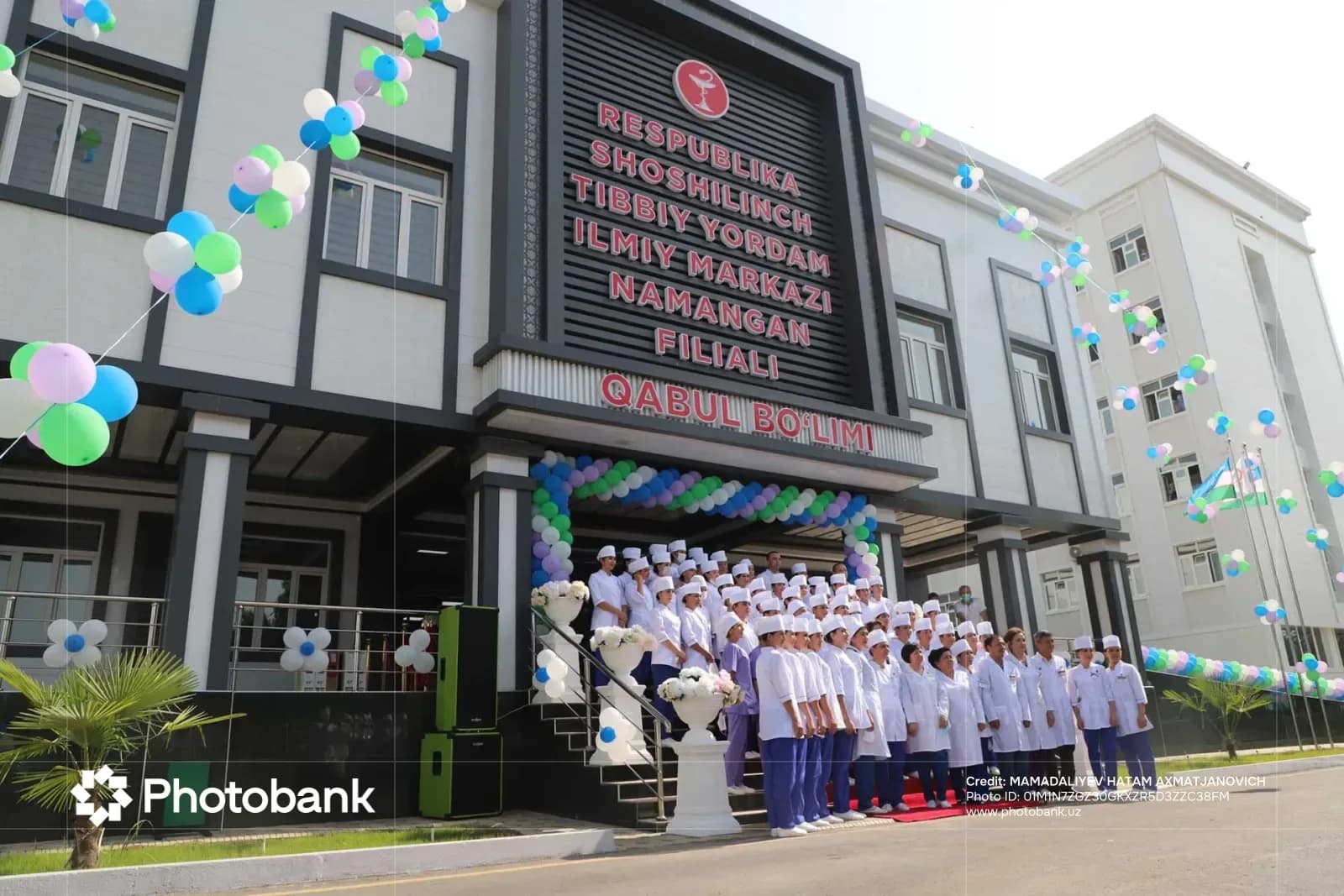 Group of medical personnel standing outside building