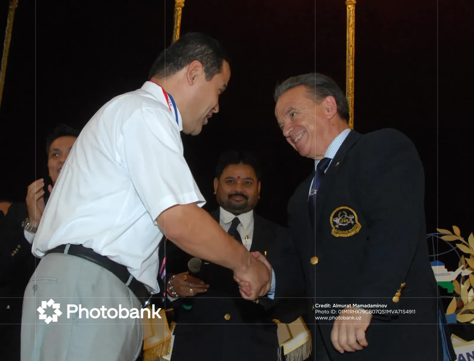 Men shaking hands indoors