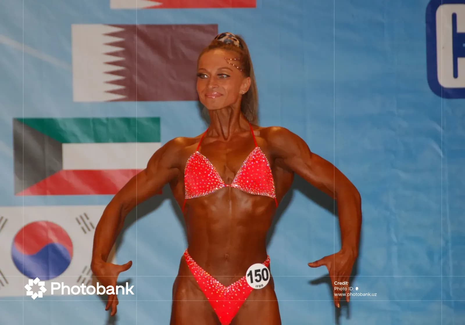 Female athlete posing in fitness competition