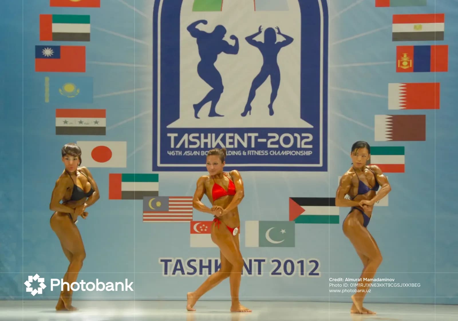 Athletes posing during a bodybuilding competition