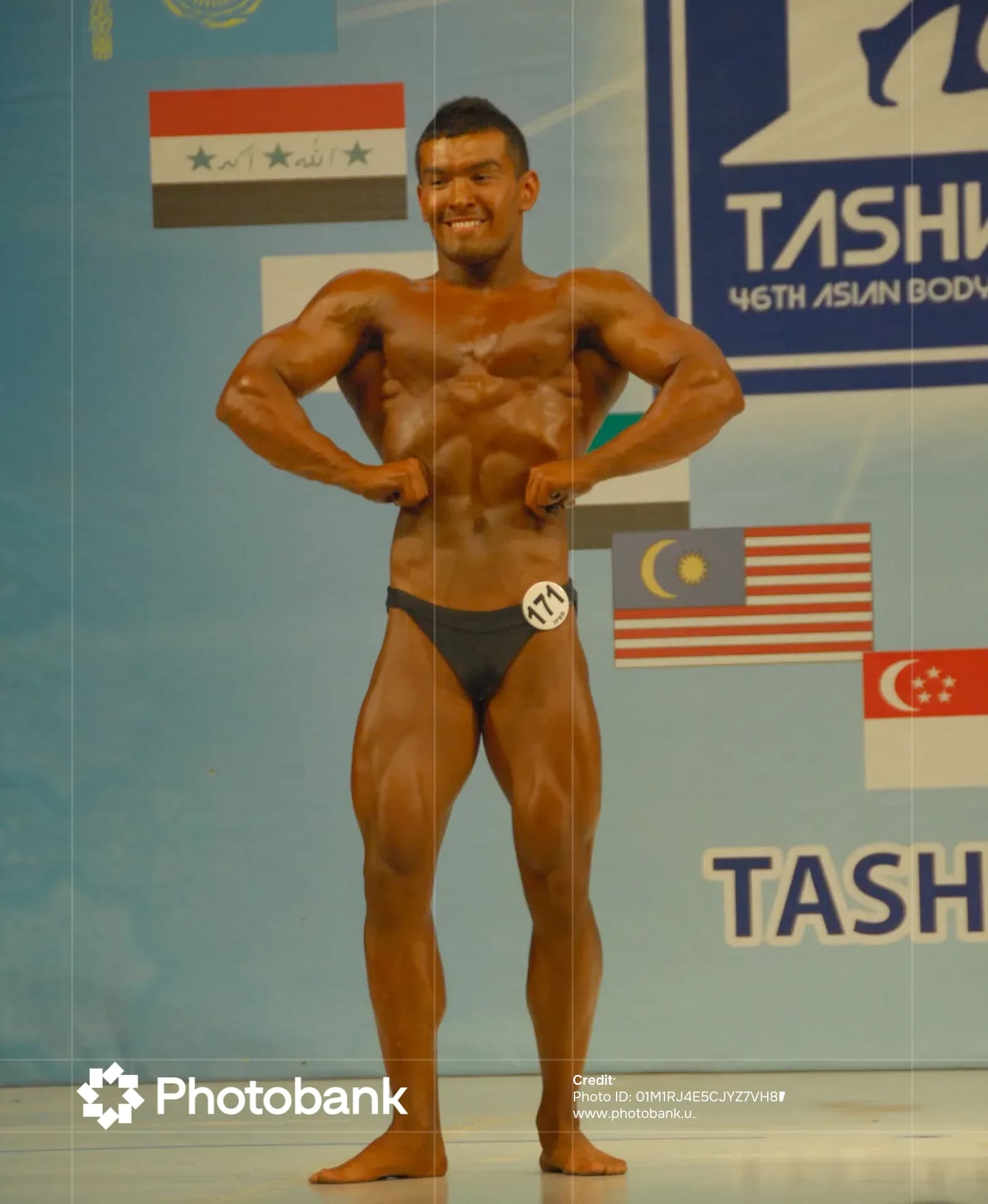 Bodybuilder posing during a competition