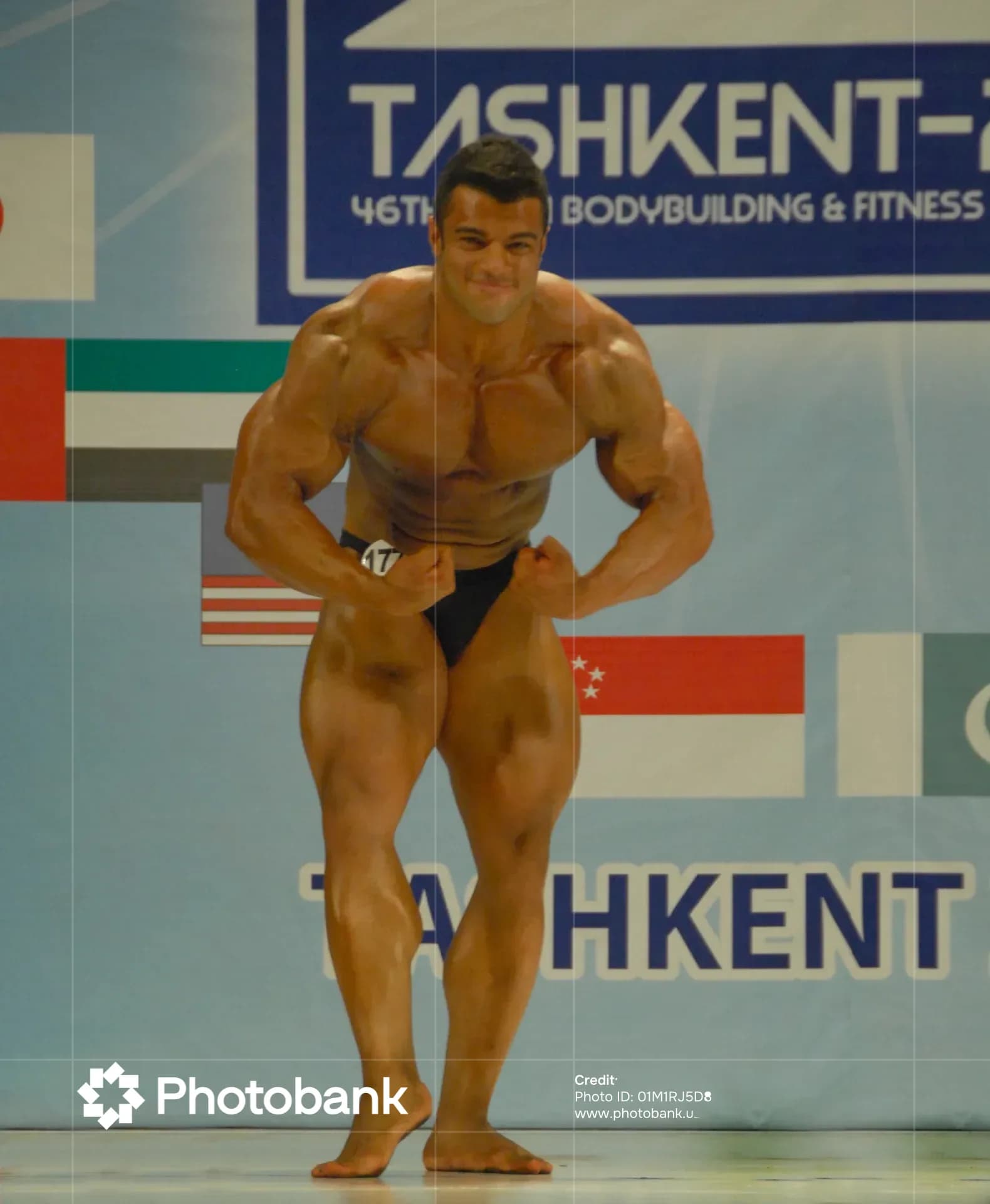 Bodybuilder posing on stage