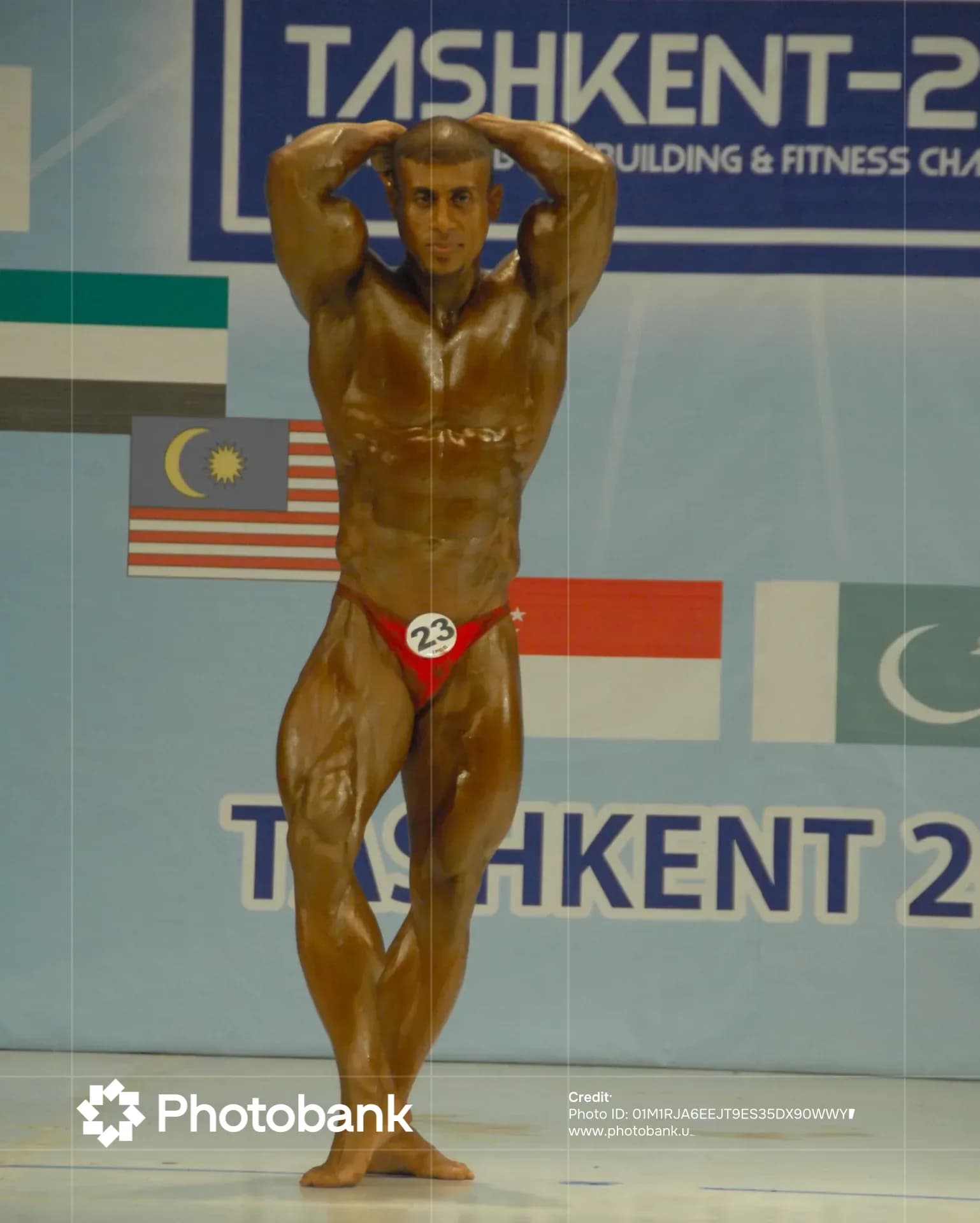 Bodybuilder posing on stage