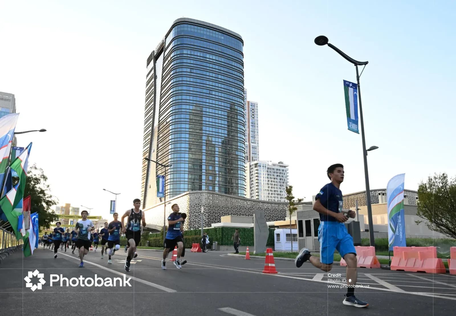 People running along a city street