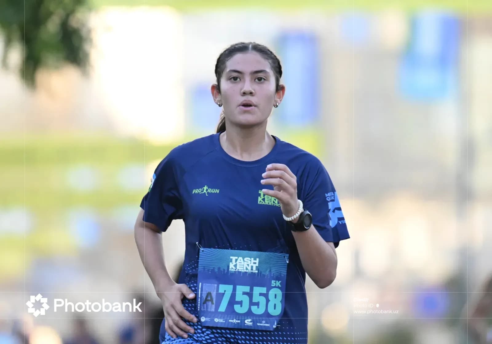 Young female athlete running outdoors