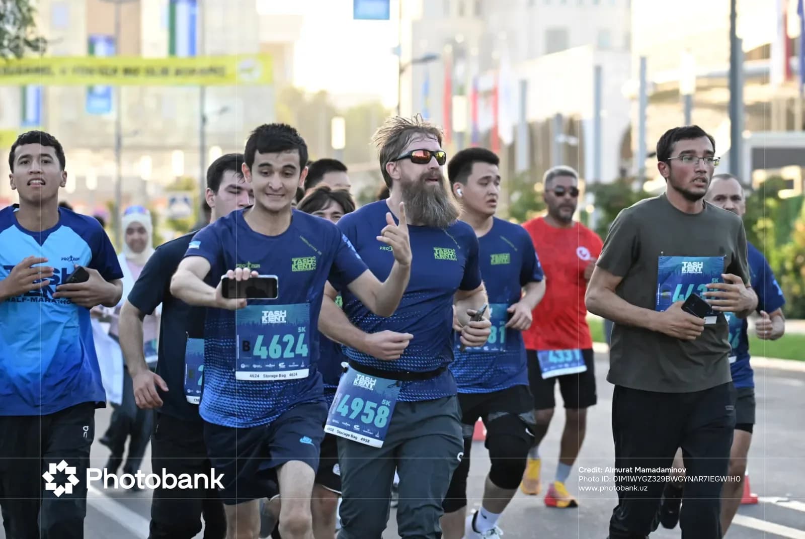 People running outdoors on a city street