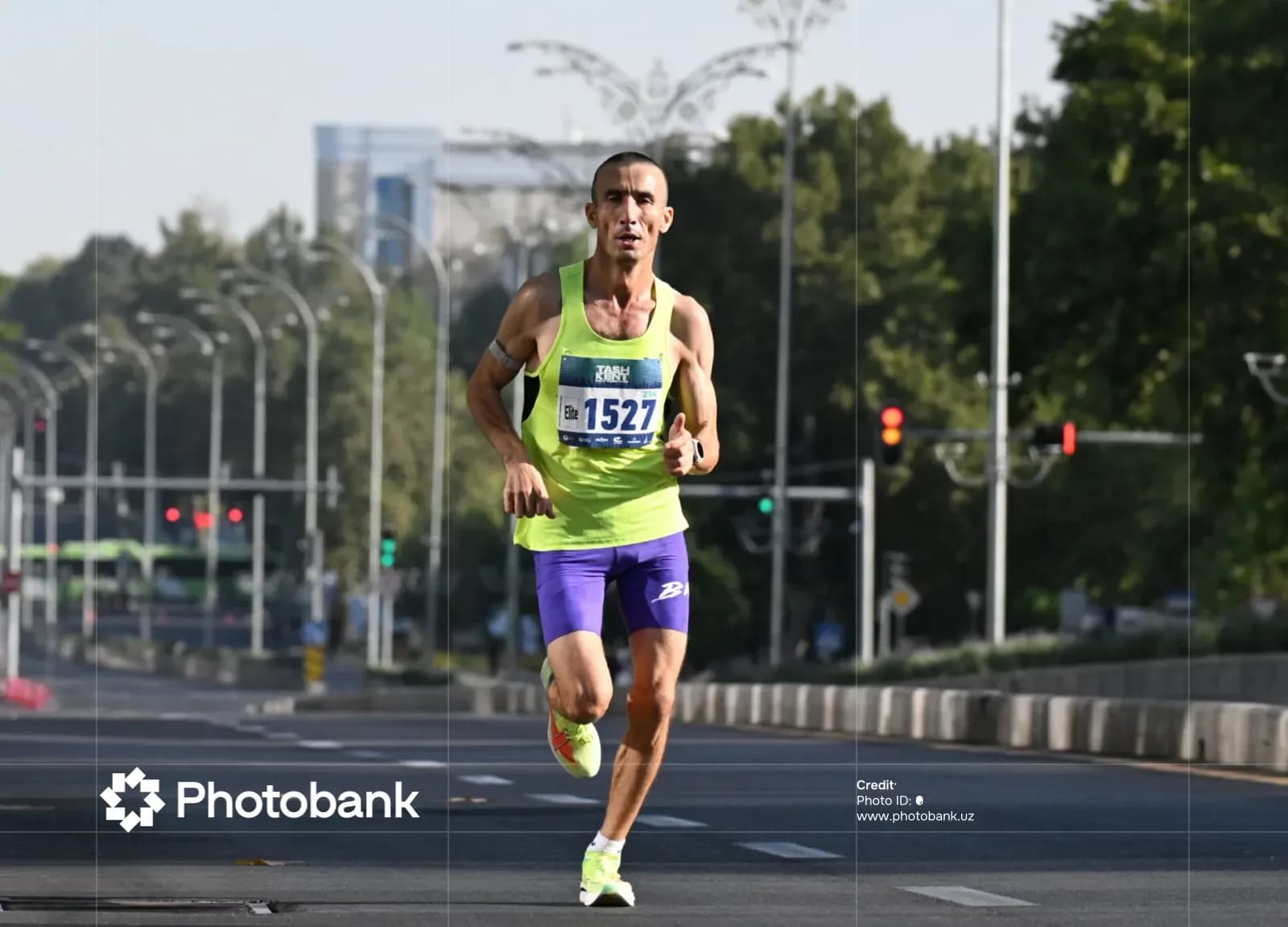 Athlete running on city street