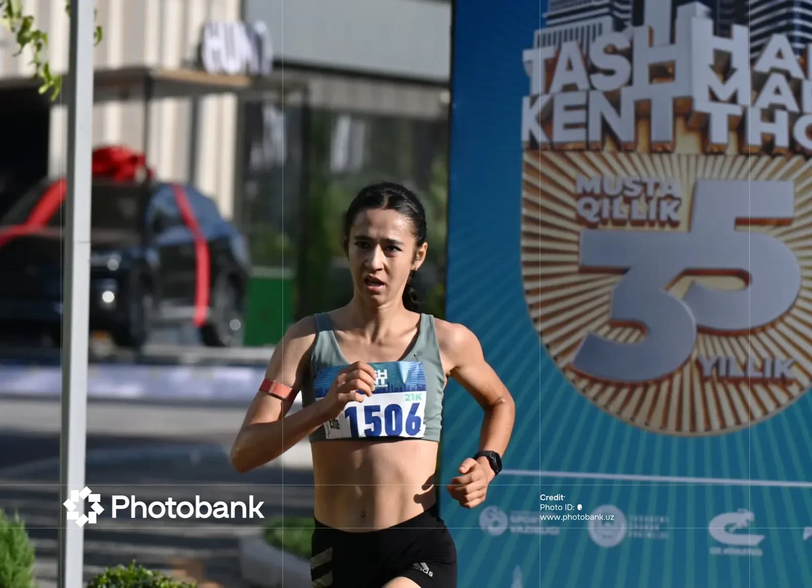 Athlete running on city street
