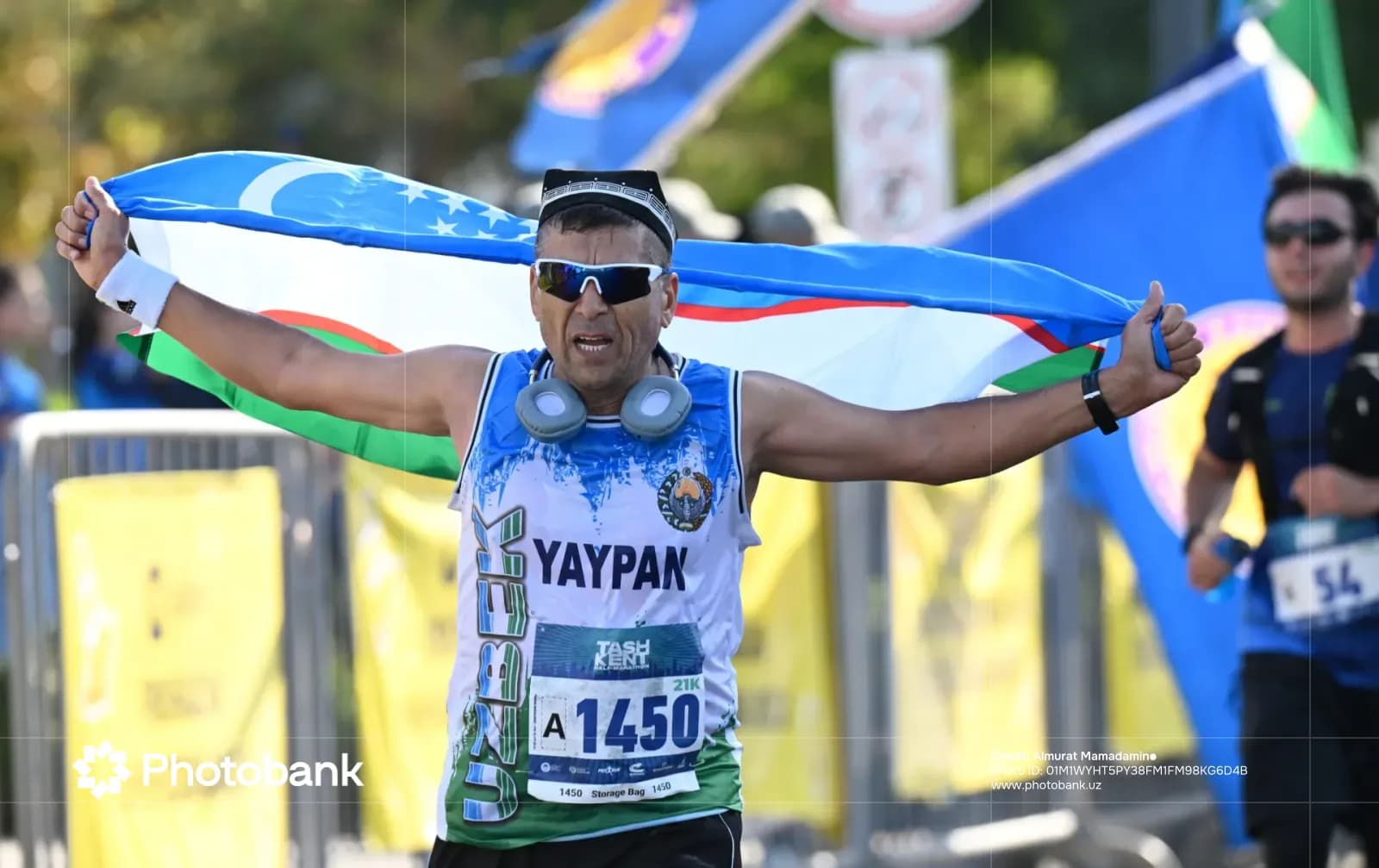 Participant holding flag while running in race