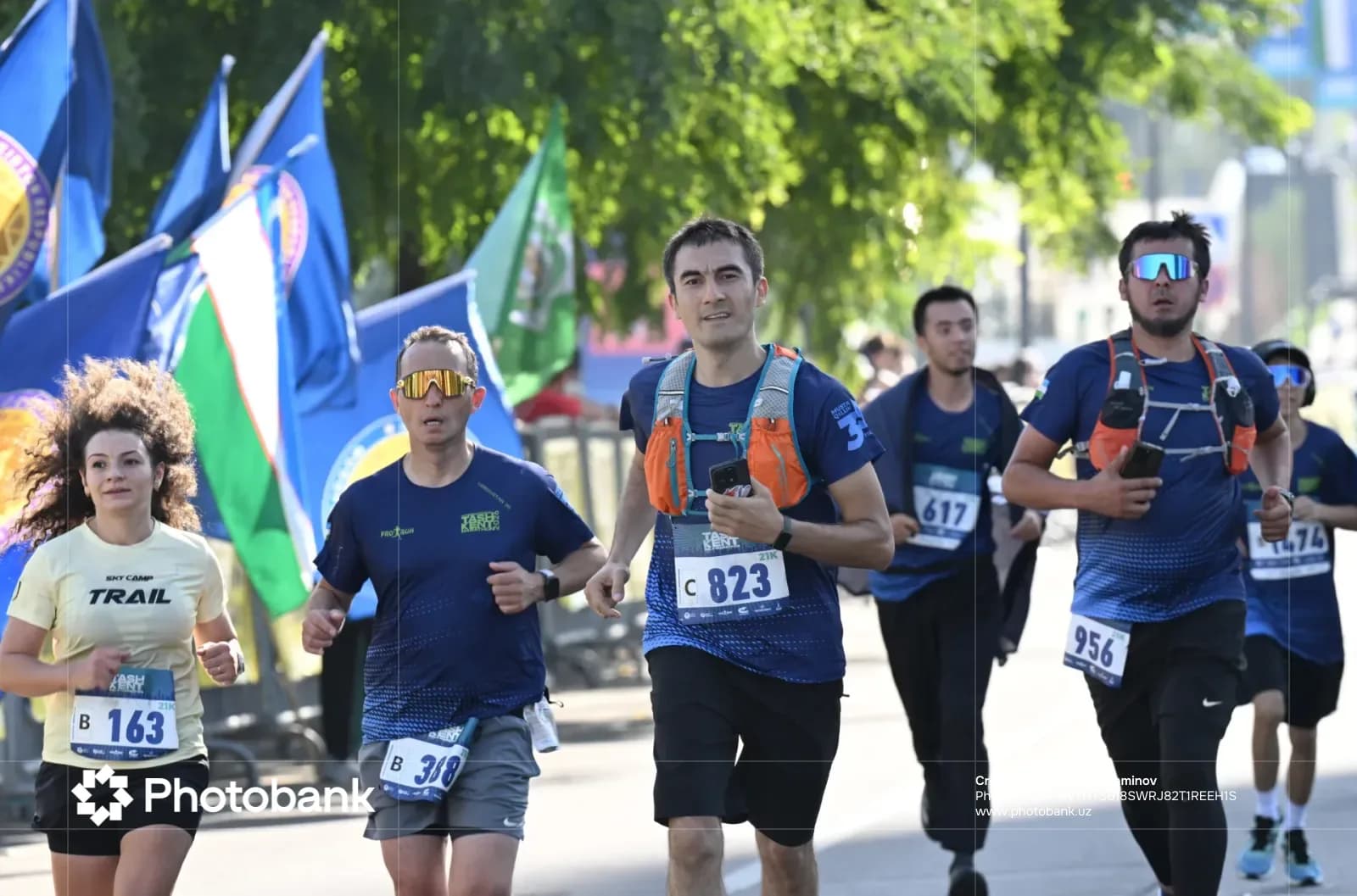 Athletes participating in a running competition on a city street