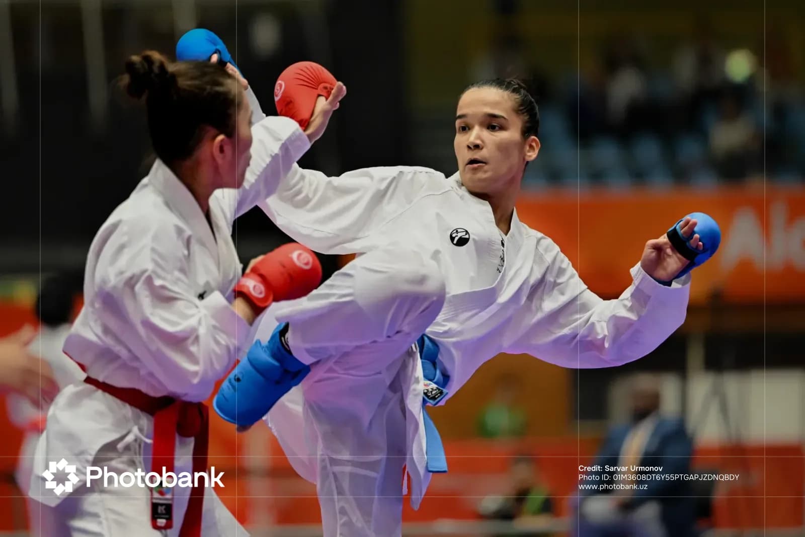 Female athletes competing in a martial arts match
