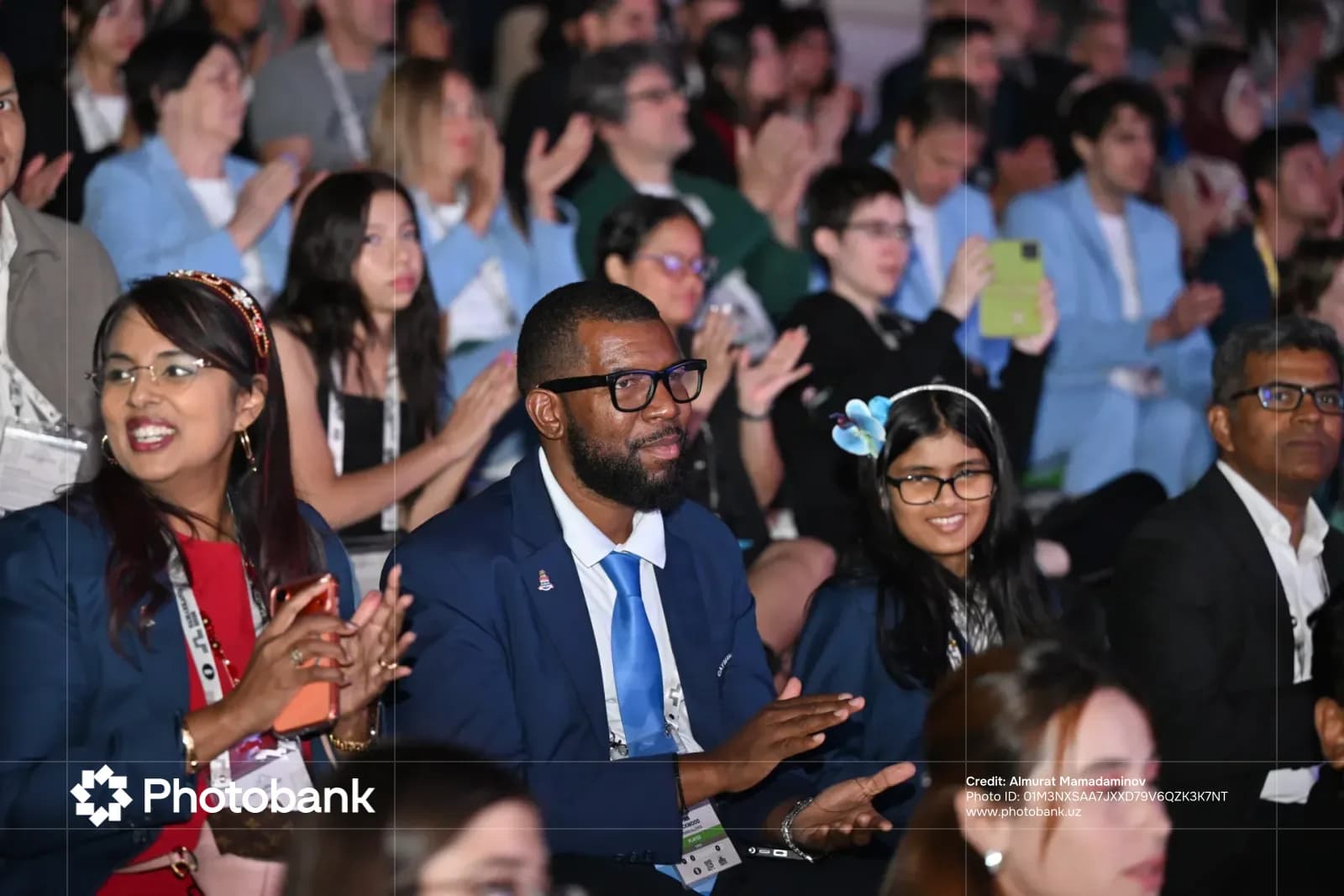 People clapping in audience