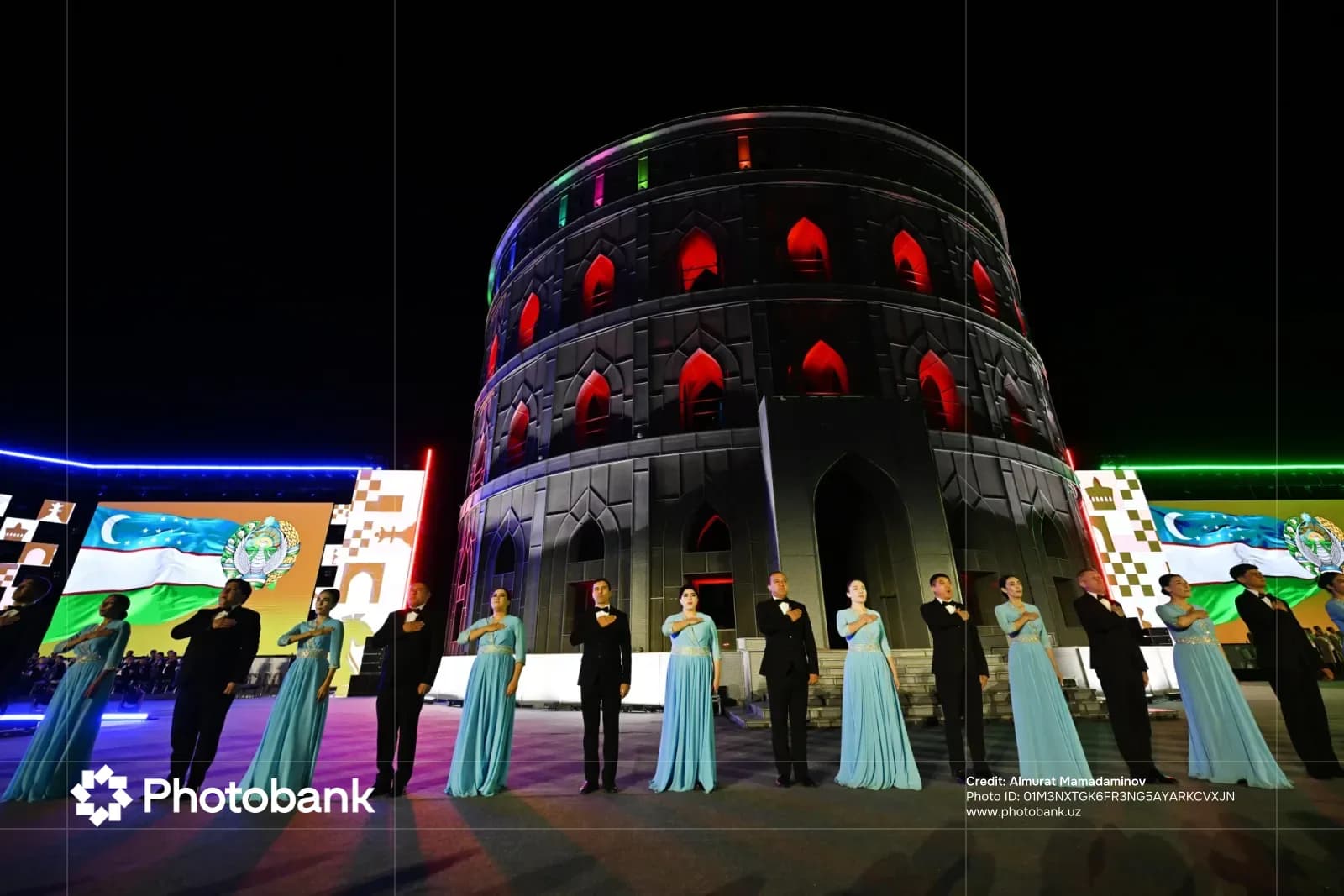 Performers on stage at night