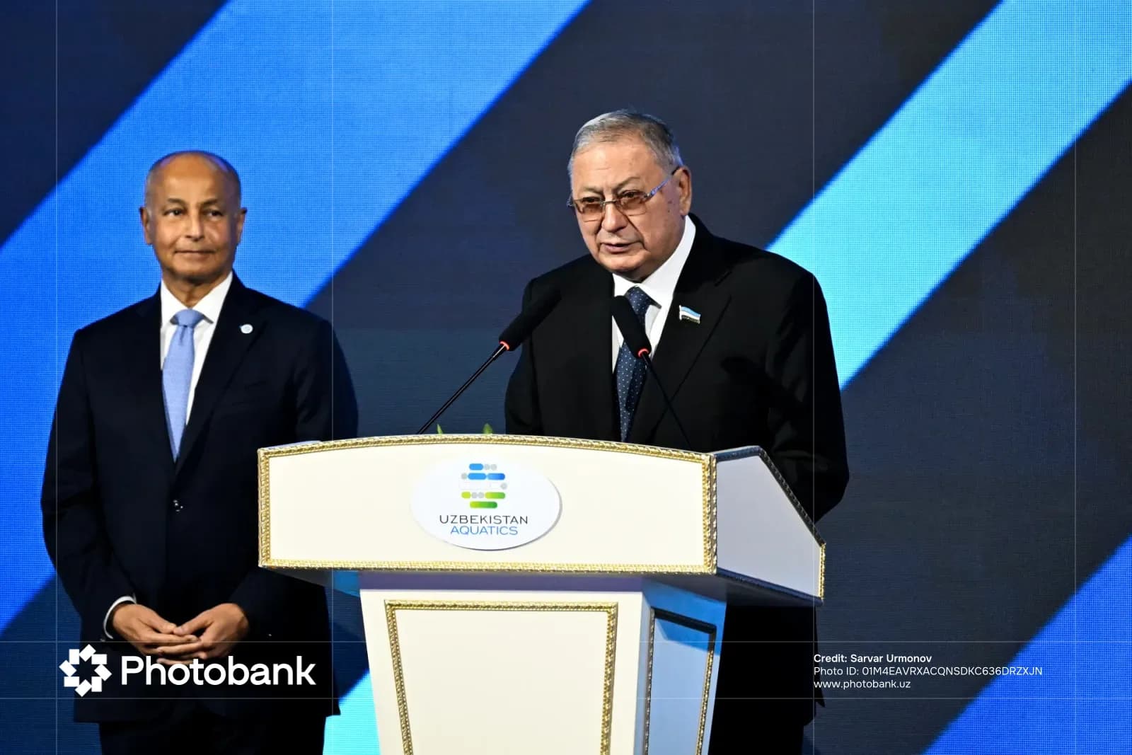 Man speaking at a podium during an event