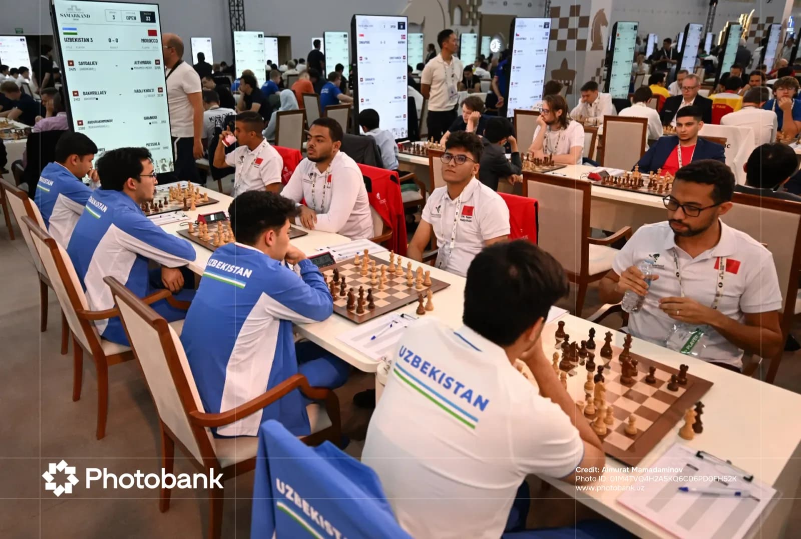 Players compete at tables during a chess tournament
