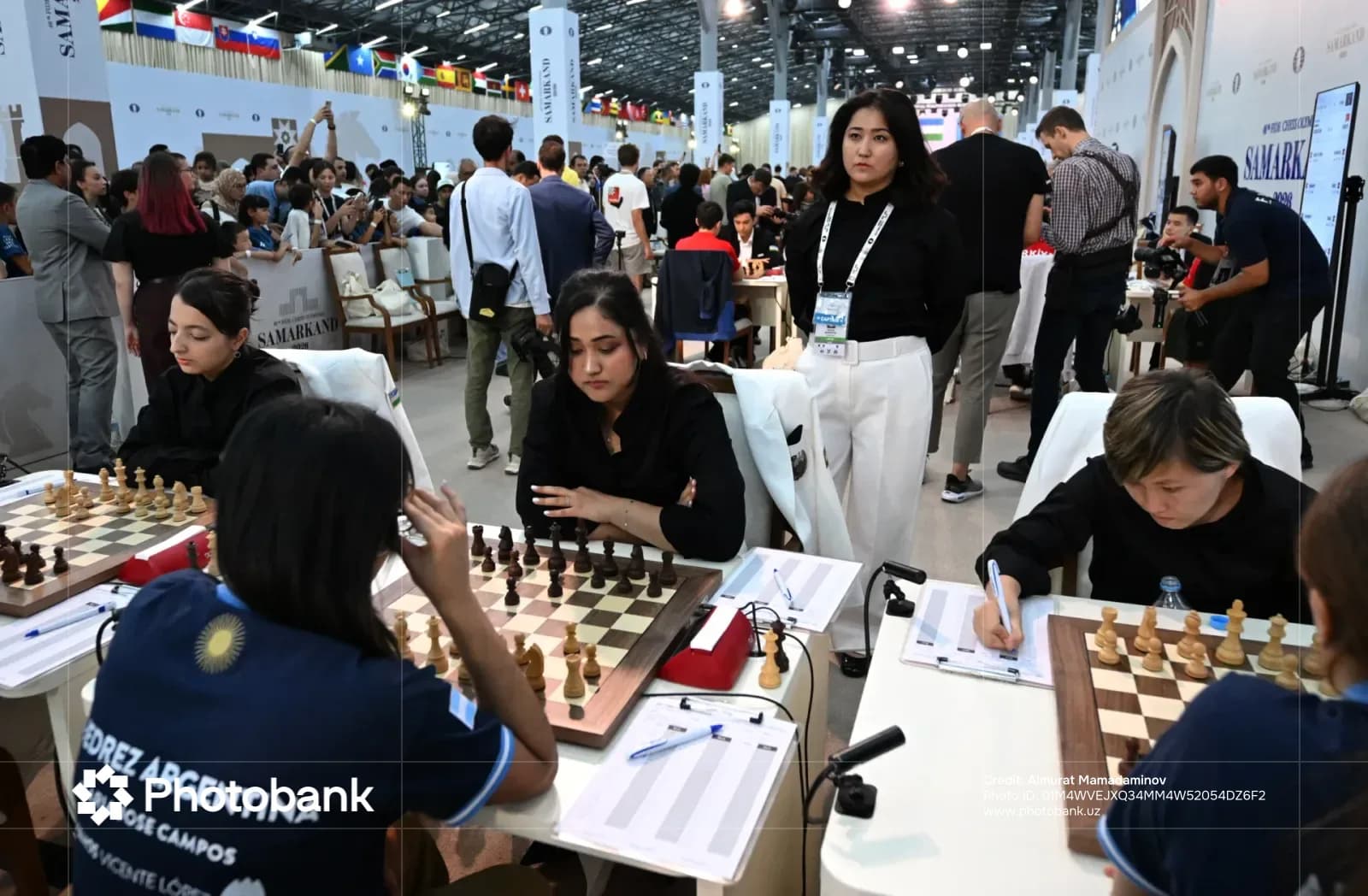 People playing chess at a competition venue