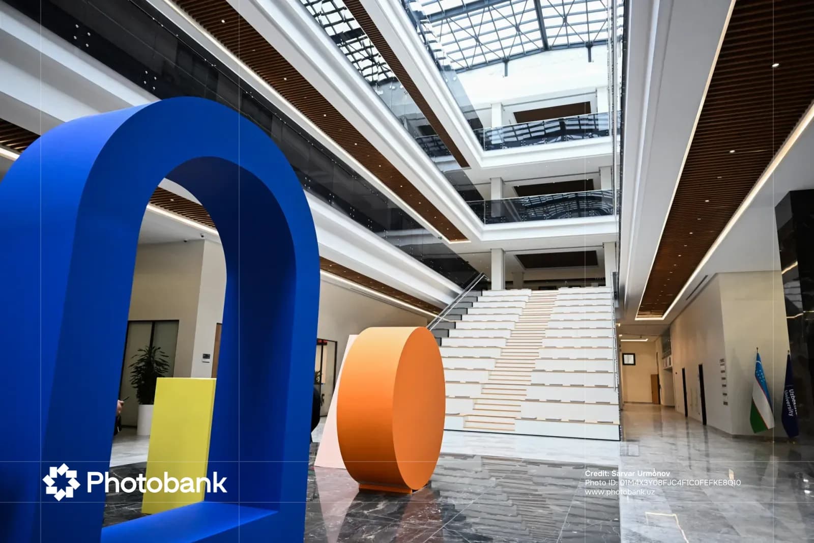 Modern multistory interior atrium with geometric installations